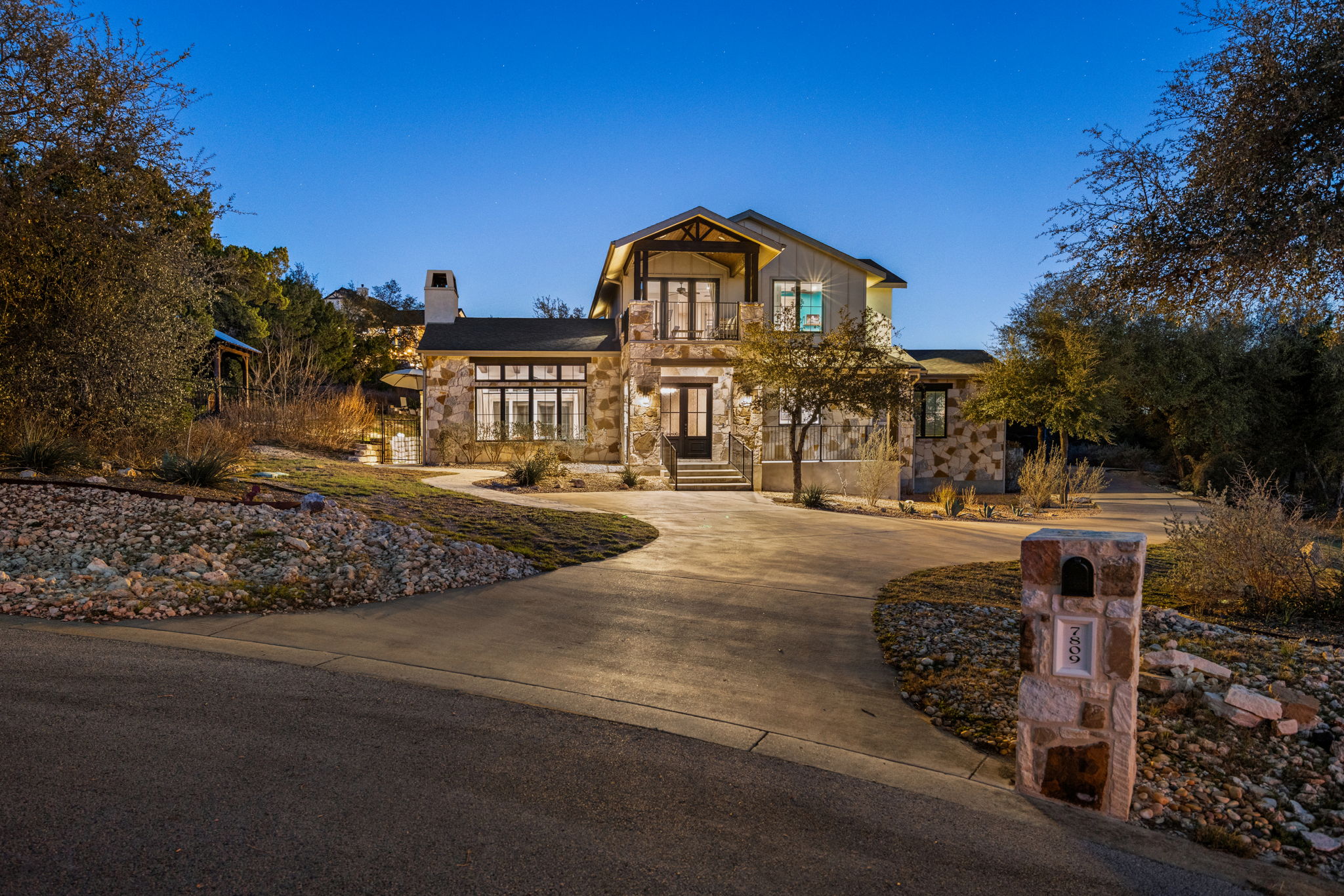 7809 Brandy Way Volente, TX 78641 - Photo 37 of 40 a view of a house with a yard