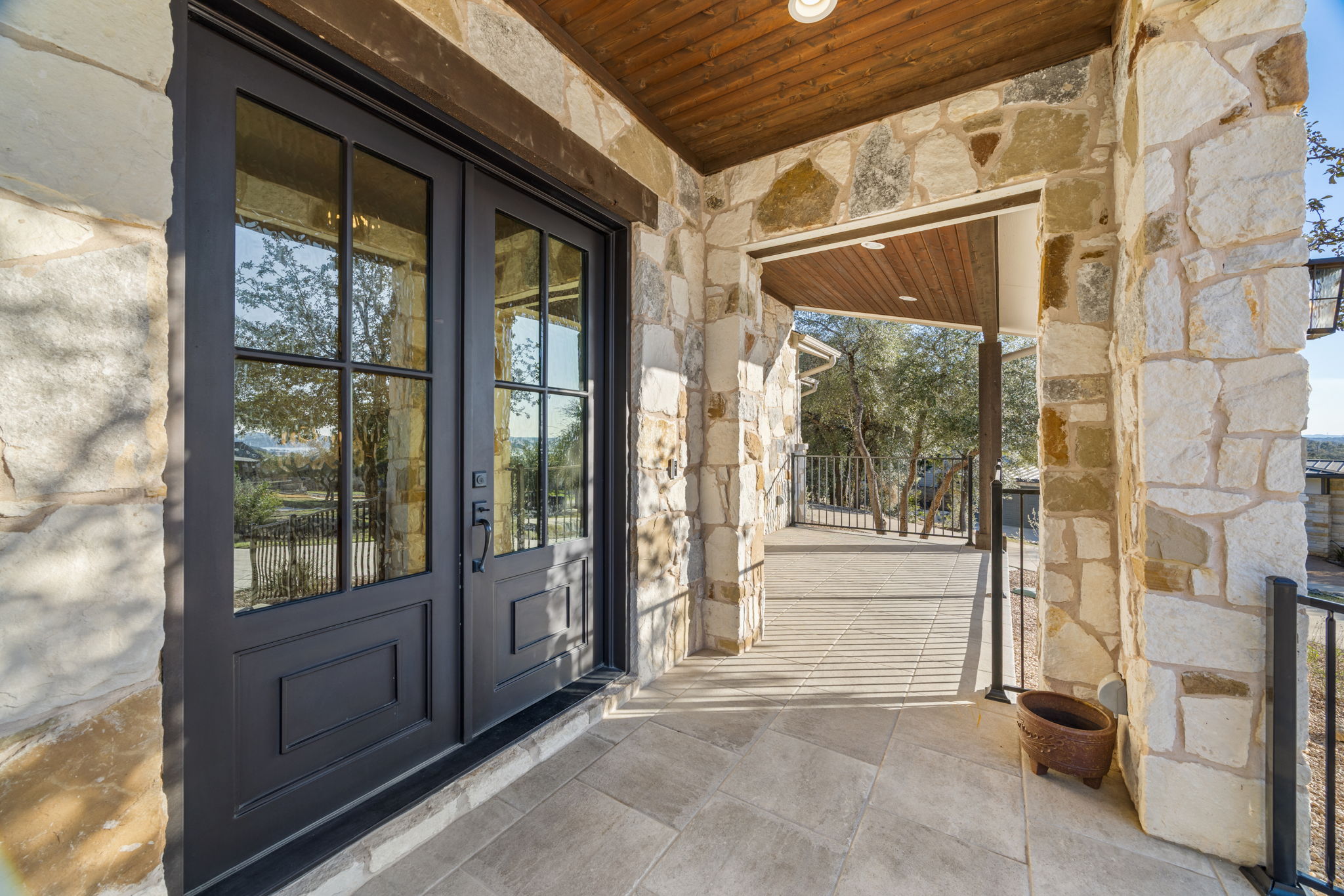 7809 Brandy Way Volente, TX 78641 - Photo 5 of 40 a view of a glass door with a yard