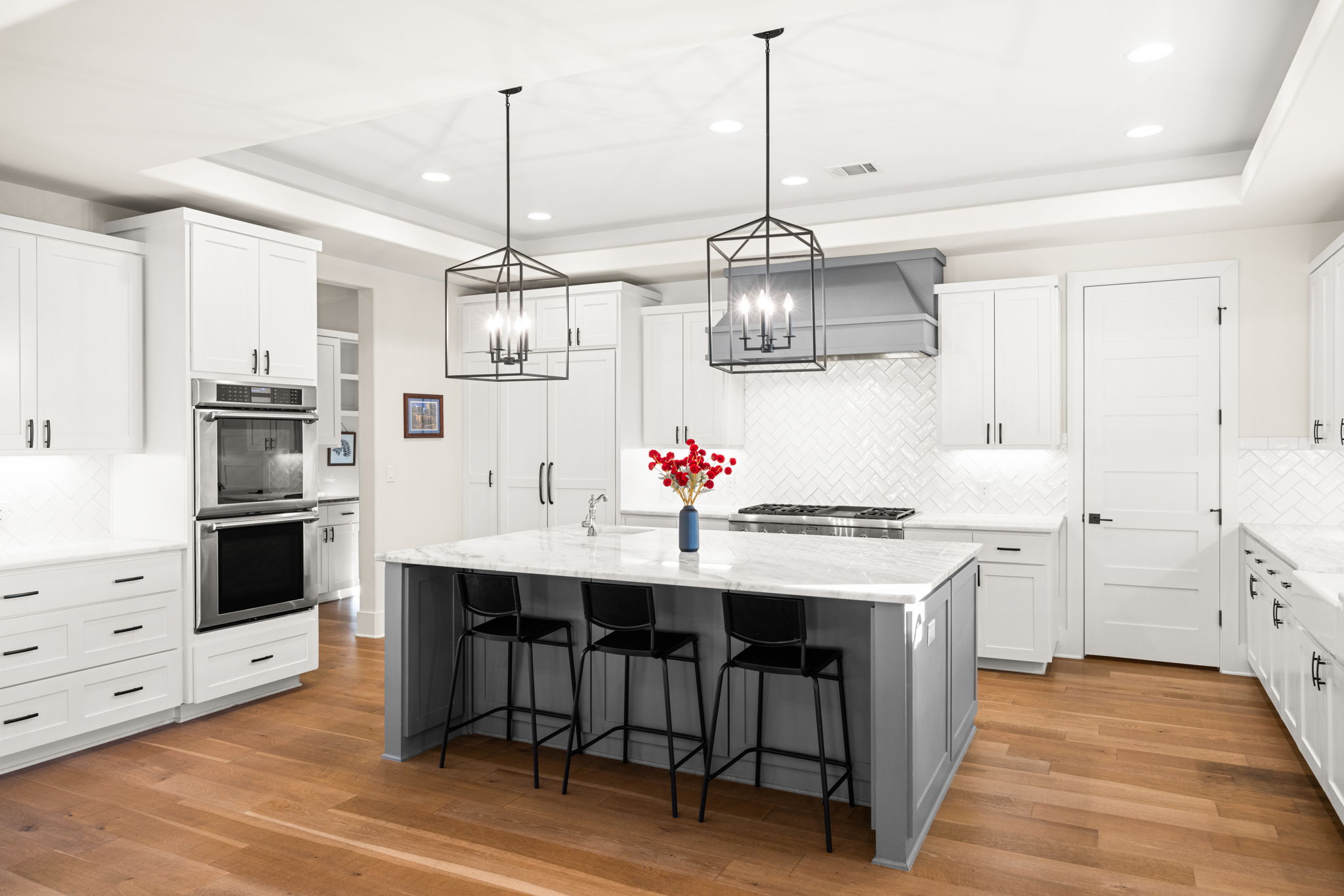 7809 Brandy Way Volente, TX 78641 - Photo 9 of 40 a kitchen with a sink stove and refrigerator
