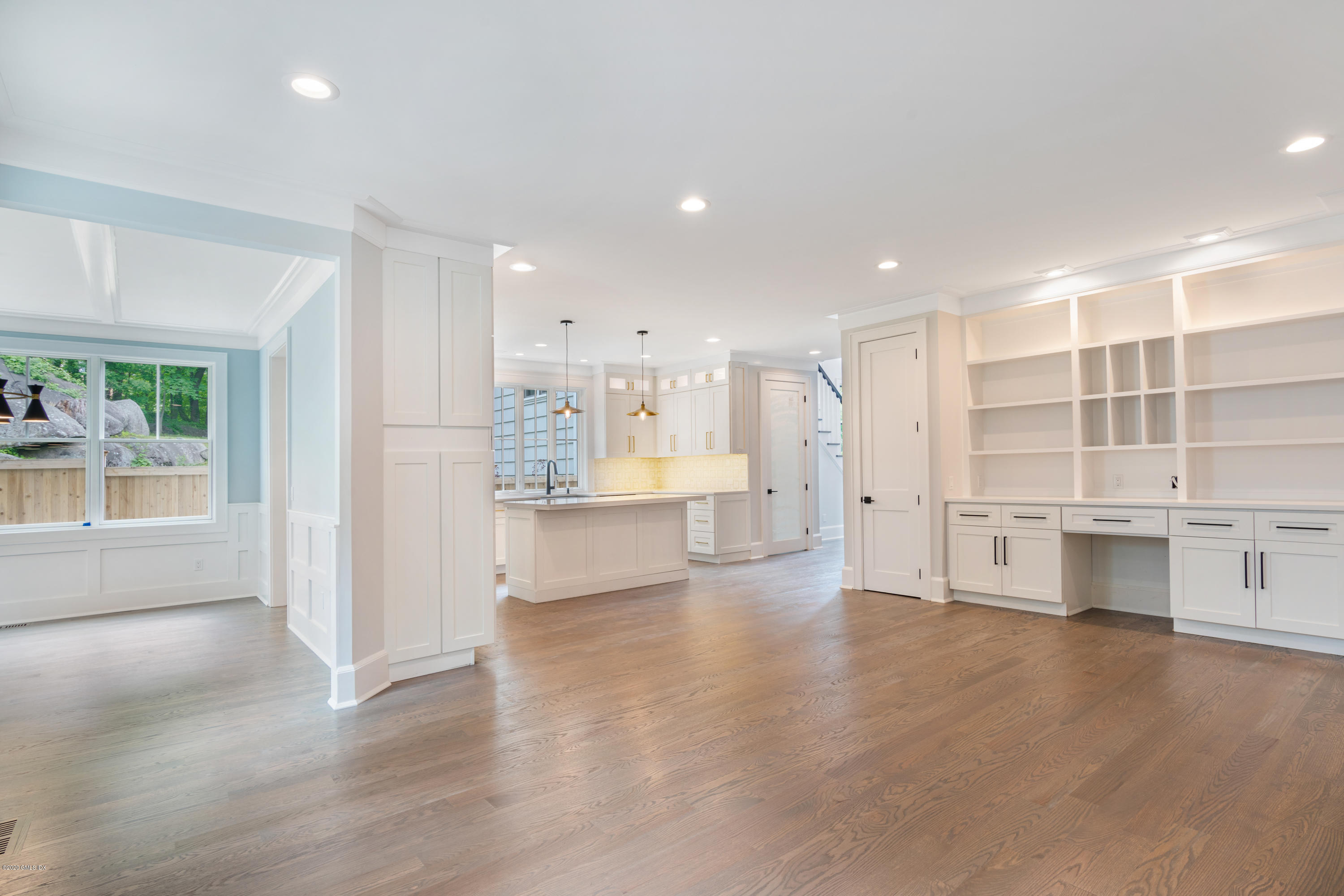 38 Cassidy Street, Unit 38 Greenwich, CT 06830 - Photo 14 of 50 a view of a kitchen with kitchen island a sink stainless steel appliances and cabinets