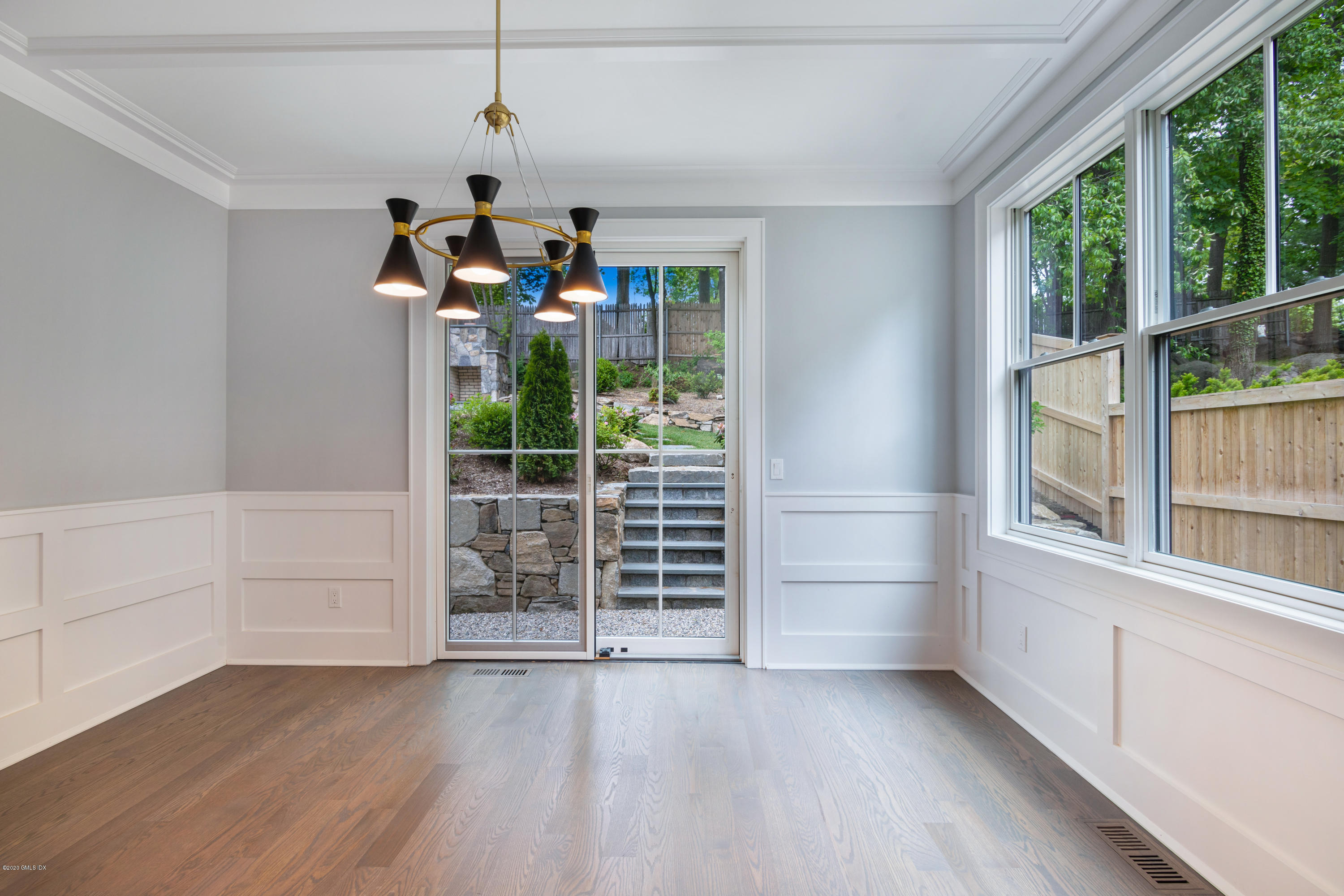 38 Cassidy Street, Unit 38 Greenwich, CT 06830 - Photo 16 of 50 a view of empty room with wooden floor and fan
