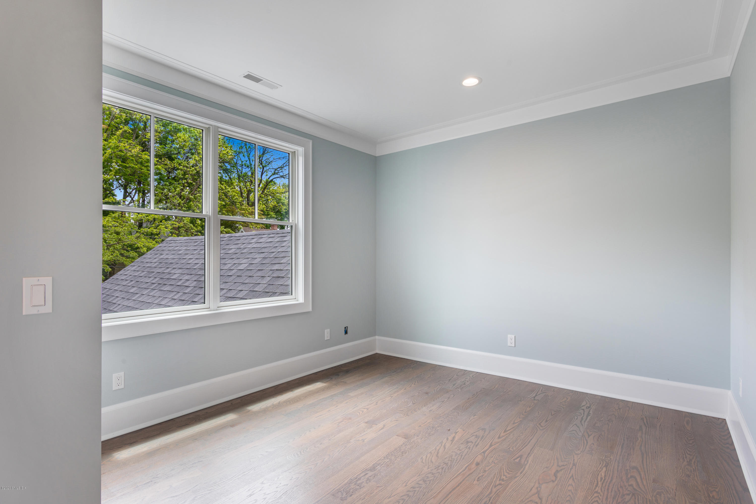38 Cassidy Street, Unit 38 Greenwich, CT 06830 - Photo 29 of 50 an empty room with a window
