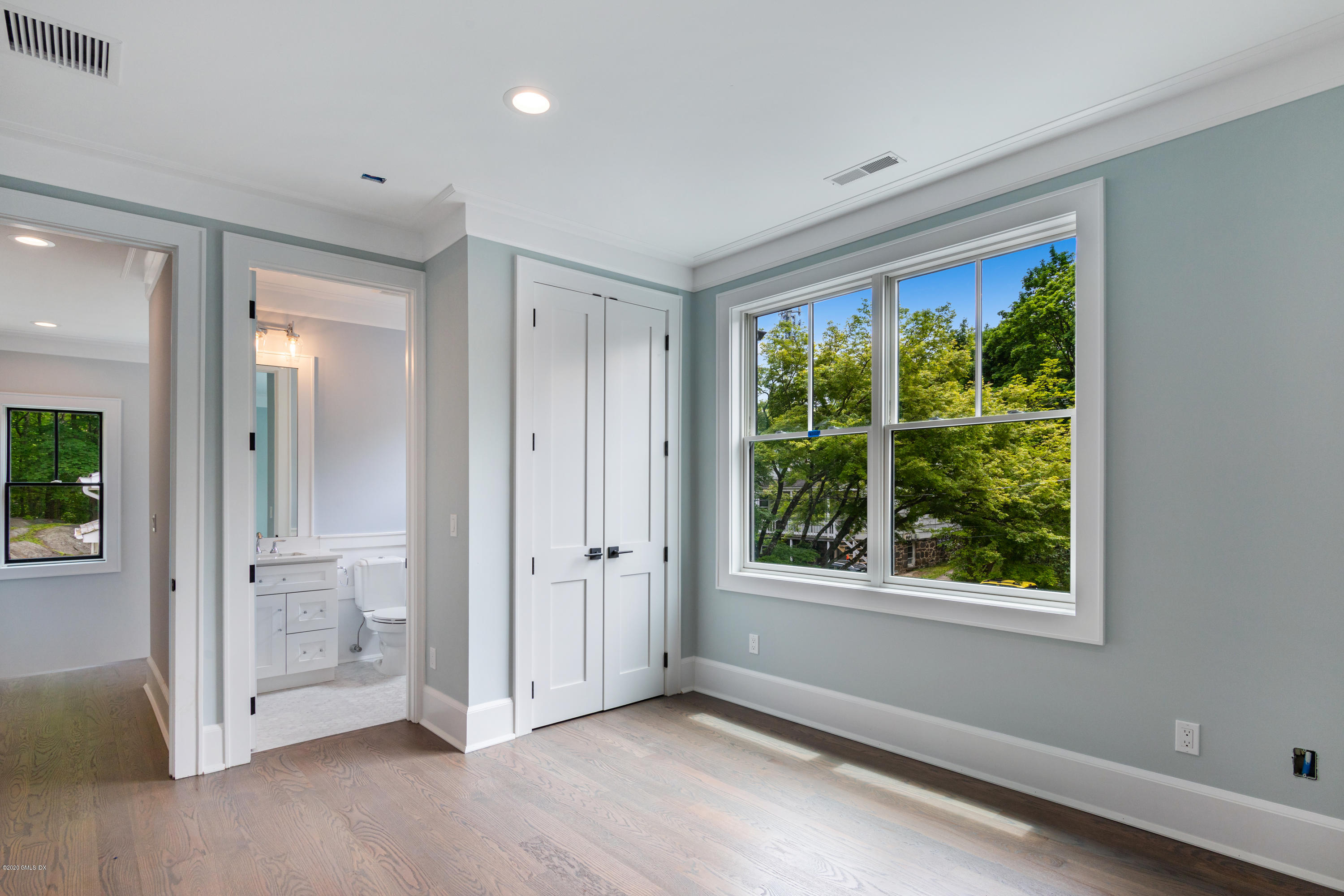 38 Cassidy Street, Unit 38 Greenwich, CT 06830 - Photo 30 of 50 a view of an empty room with a window