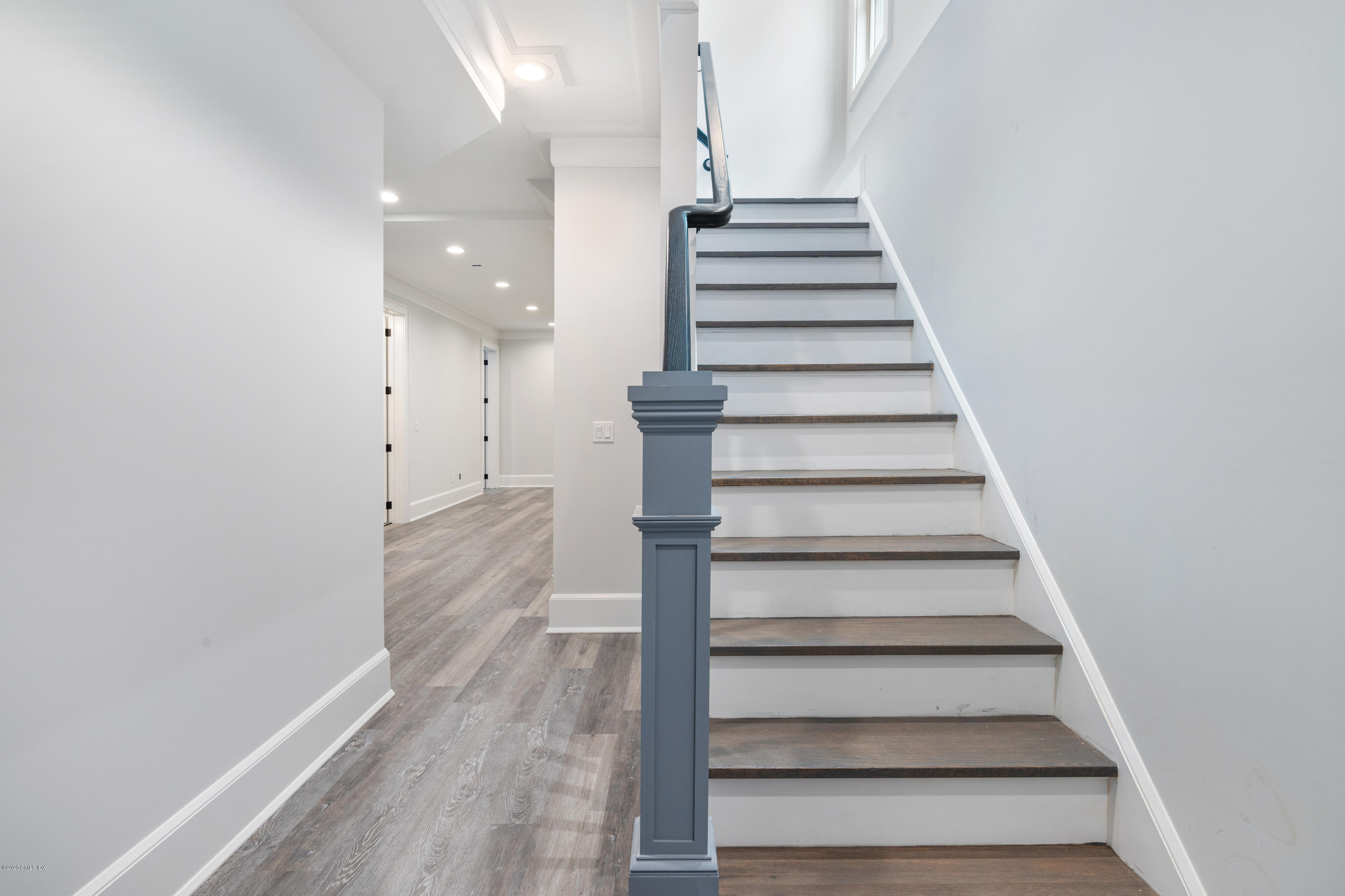 38 Cassidy Street, Unit 38 Greenwich, CT 06830 - Photo 39 of 50 a view of entryway and hall with wooden floor