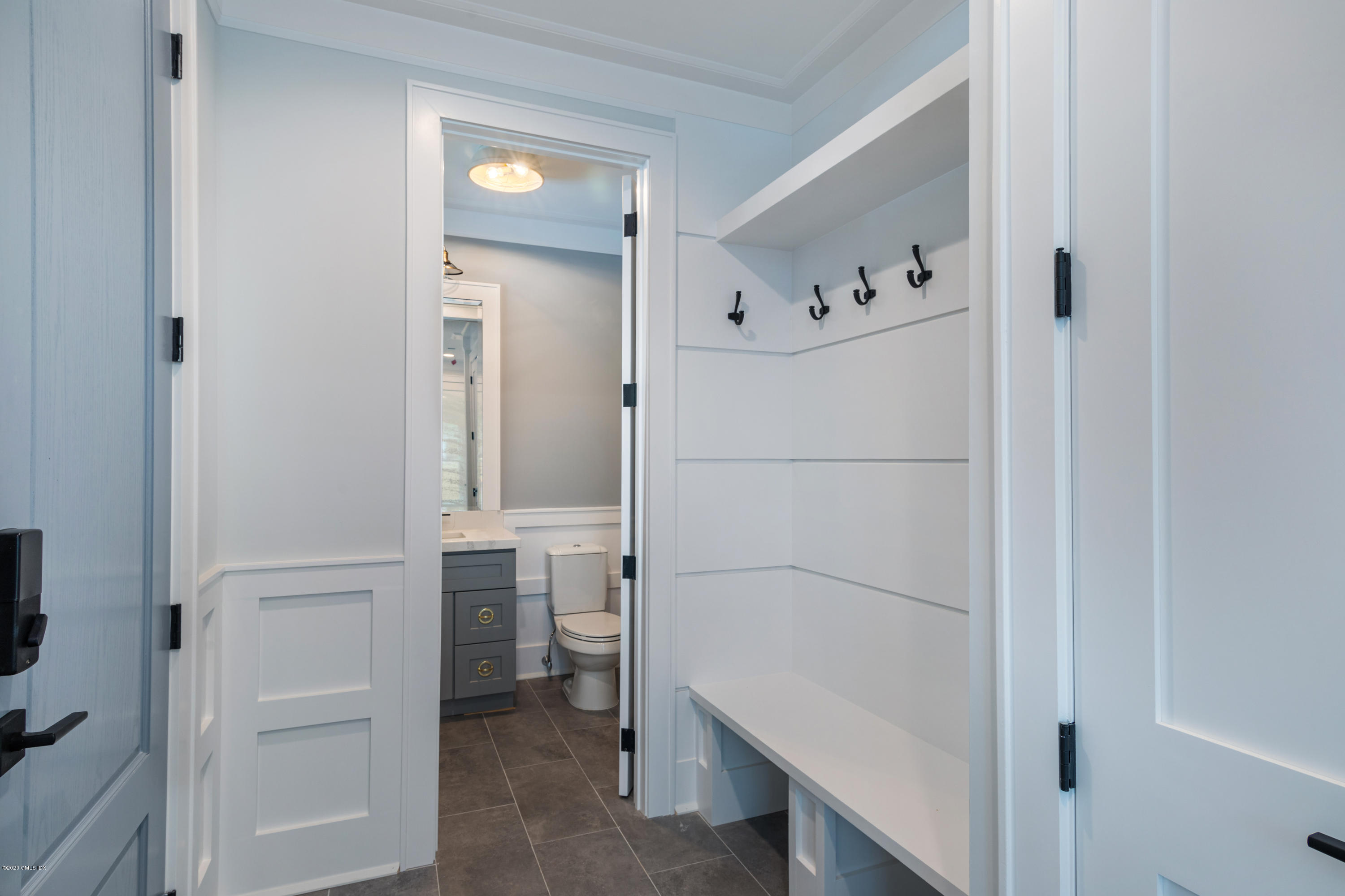 38 Cassidy Street, Unit 38 Greenwich, CT 06830 - Photo 44 of 50 a room with table and closet