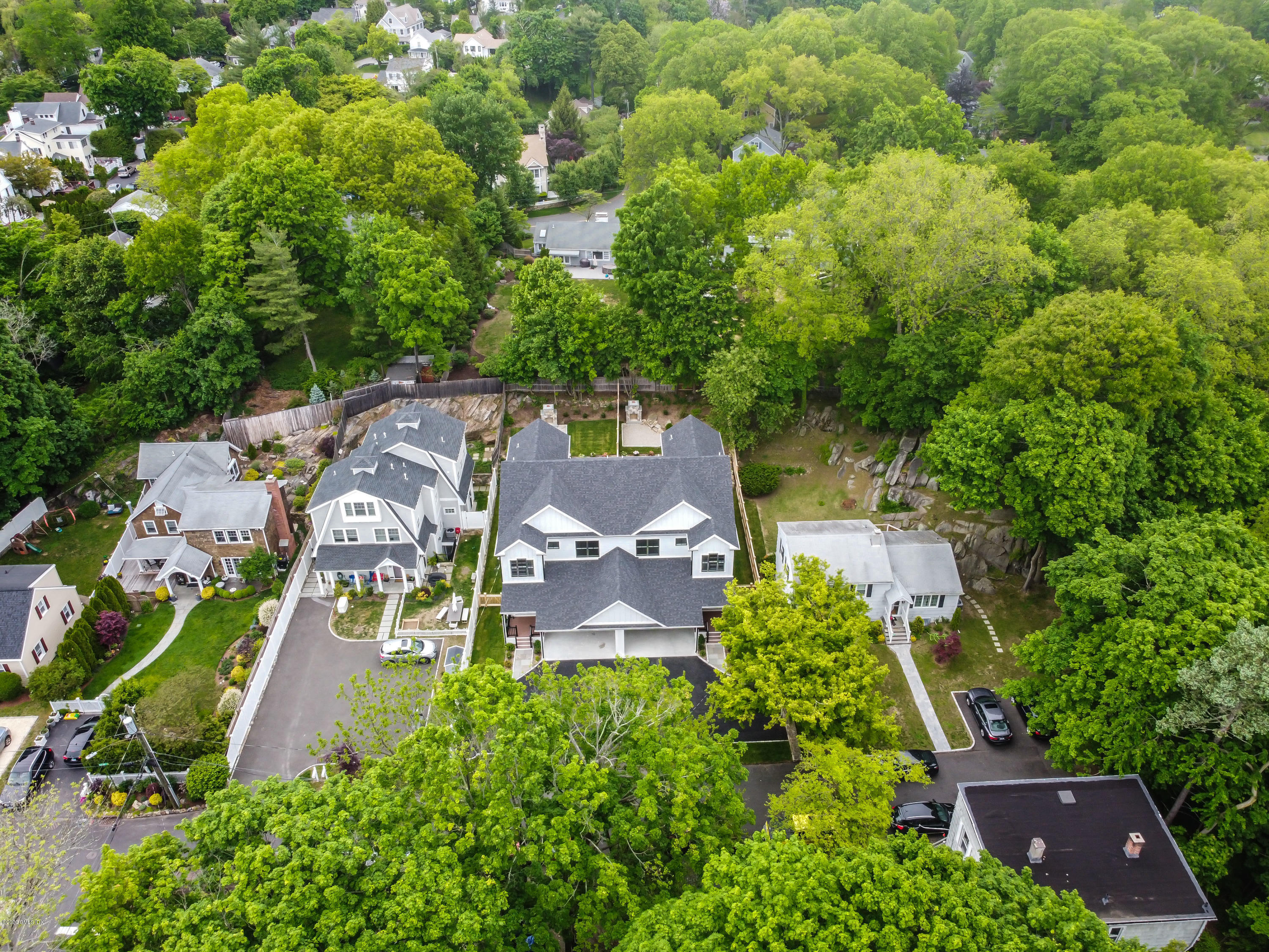 38 Cassidy Street, Unit 38 Greenwich, CT 06830 - Photo 46 of 50 an aerial view of residential house with outdoor space and trees all around