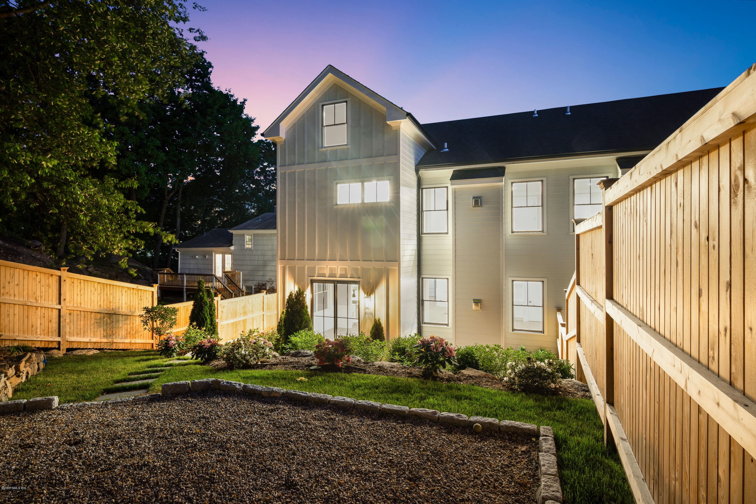 38 Cassidy Street, Unit 38 Greenwich, CT 06830 - Photo 5 of 50 a front view of a house with garden