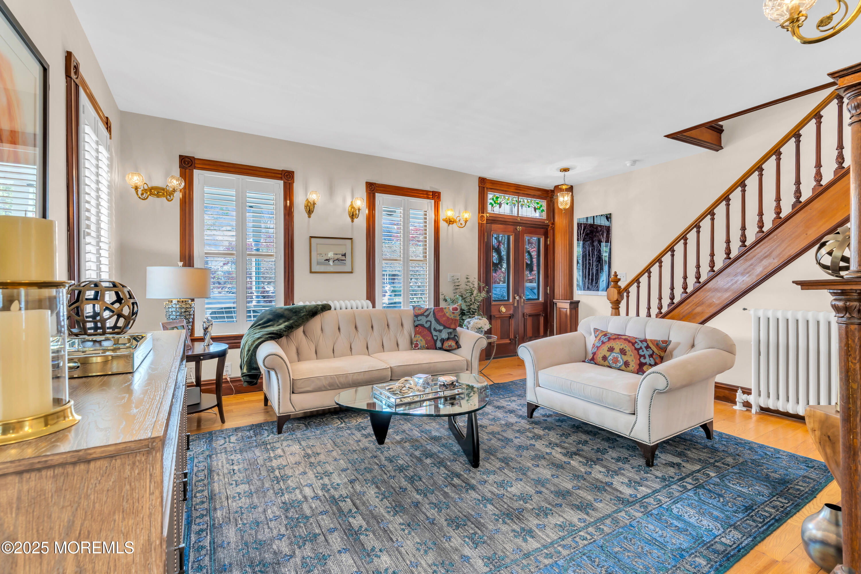 44 Irving Place Red Bank, NJ 07701 - Photo 13 of 74 a living room with furniture and a table with wooden floor