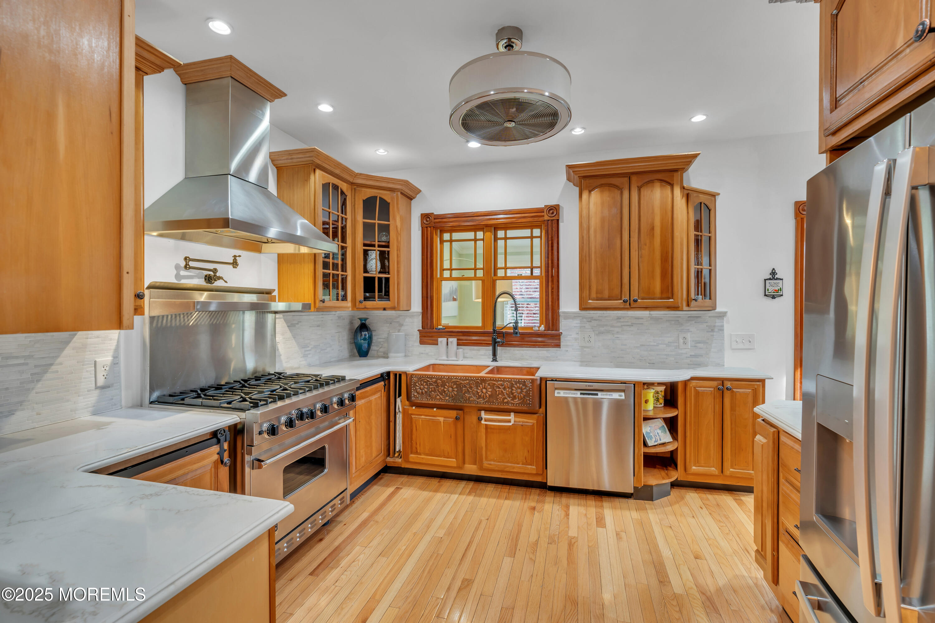 44 Irving Place Red Bank, NJ 07701 - Photo 26 of 74 a kitchen with stainless steel appliances granite countertop a stove and a sink