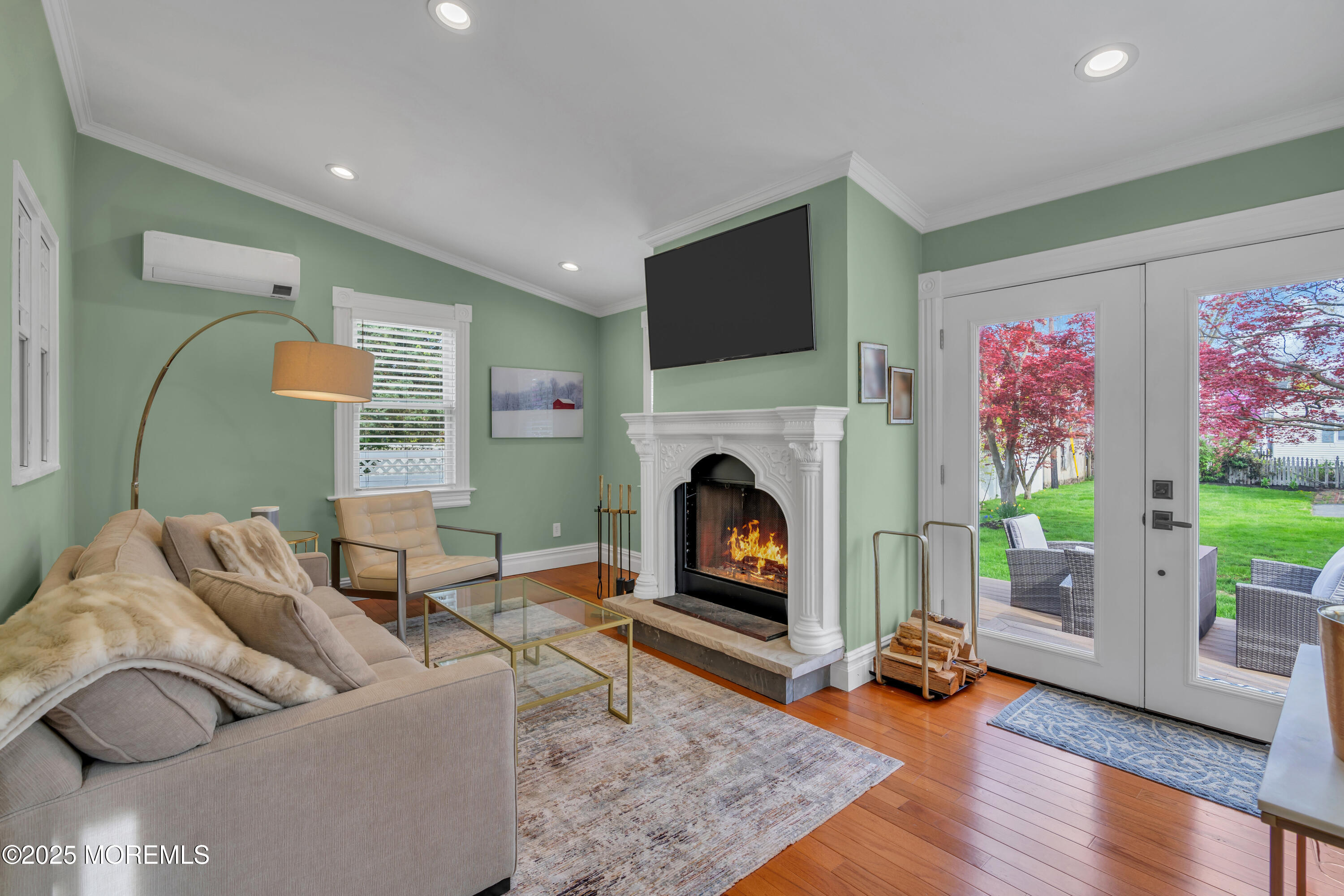 44 Irving Place Red Bank, NJ 07701 - Photo 31 of 74 a living room with furniture and a fireplace