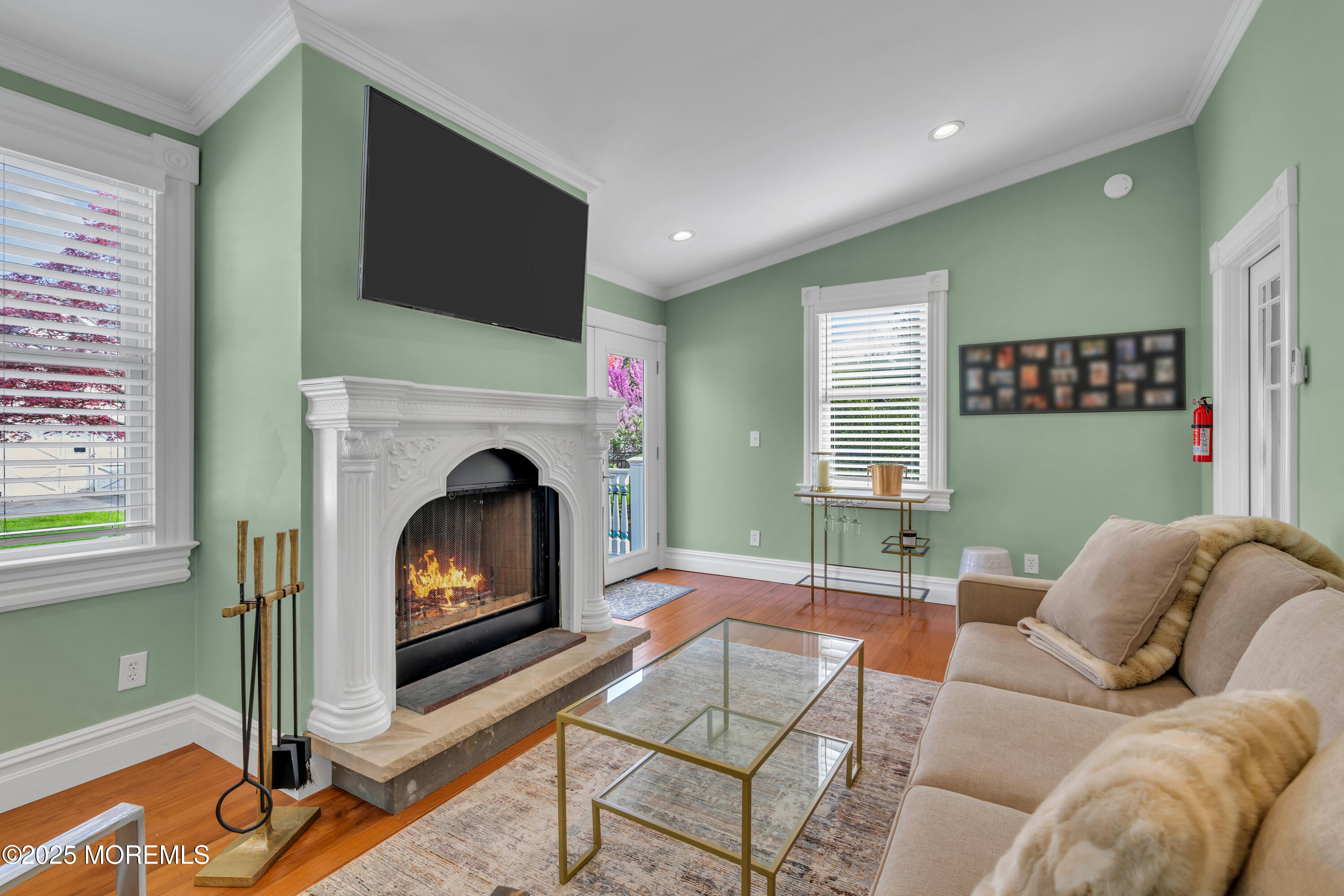 44 Irving Place Red Bank, NJ 07701 - Photo 32 of 74 a living room with furniture and a fireplace
