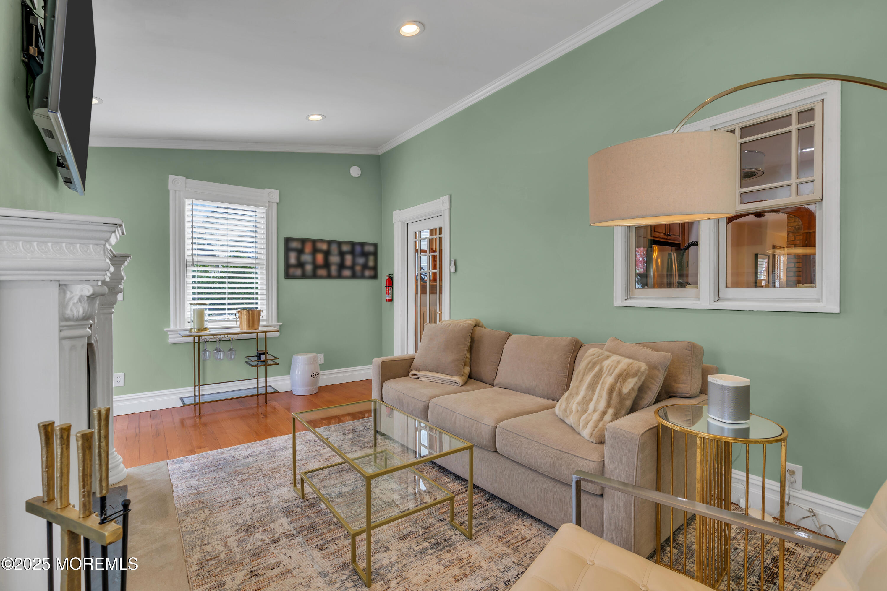 44 Irving Place Red Bank, NJ 07701 - Photo 33 of 74 a living room with furniture and a fireplace