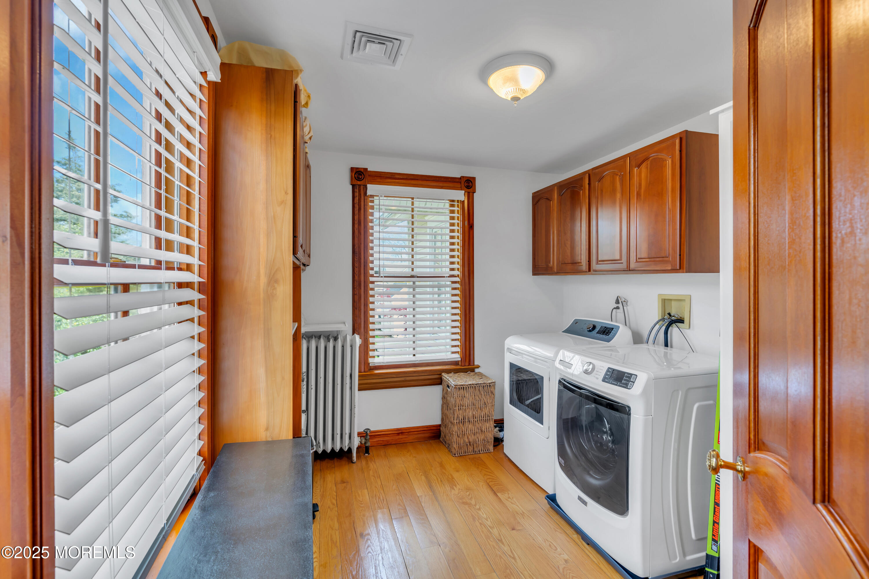 44 Irving Place Red Bank, NJ 07701 - Photo 35 of 74 a kitchen with a stove a sink and a refrigerator