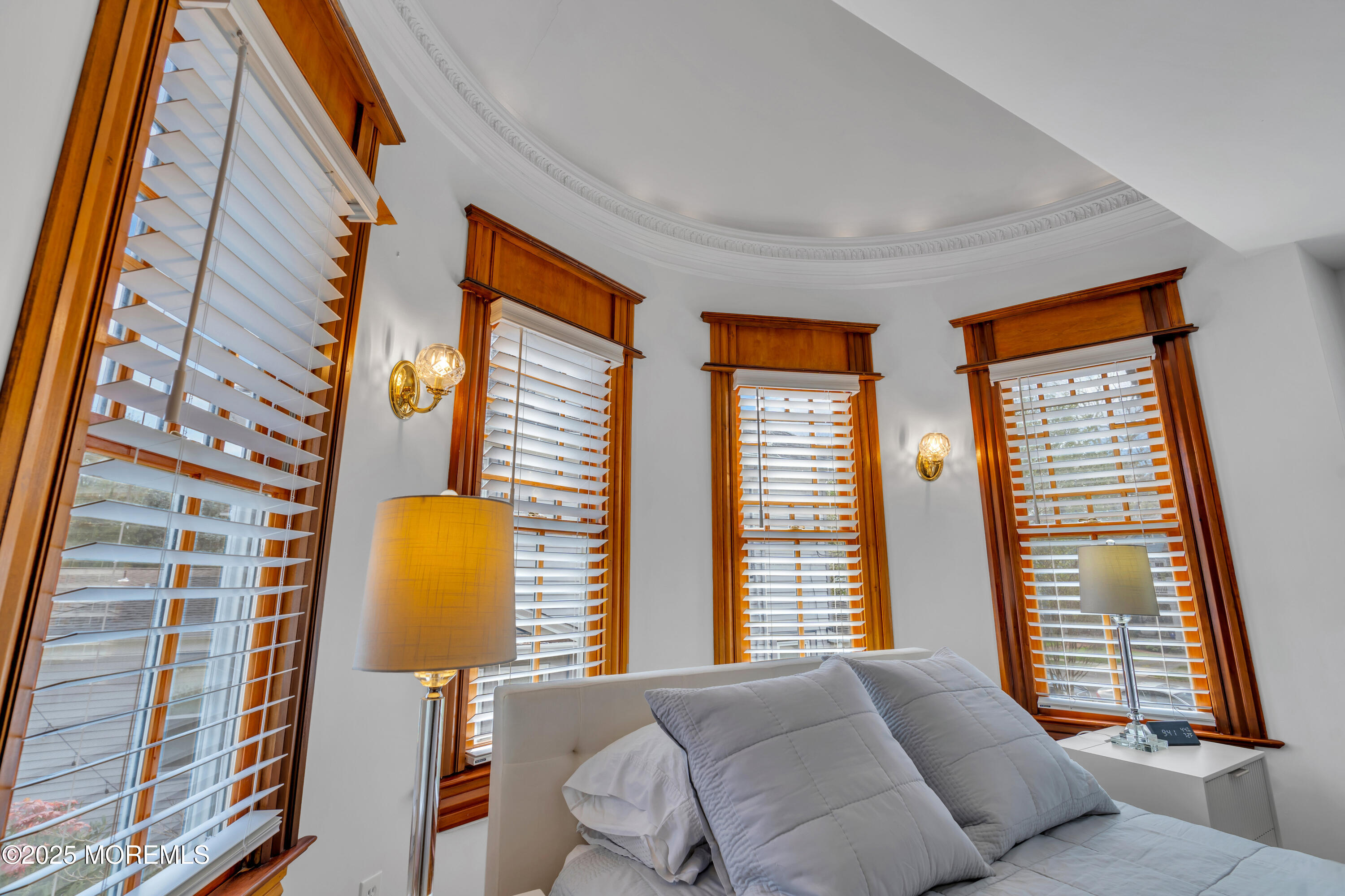 44 Irving Place Red Bank, NJ 07701 - Photo 40 of 74 a bedroom with a bed and wooden floor