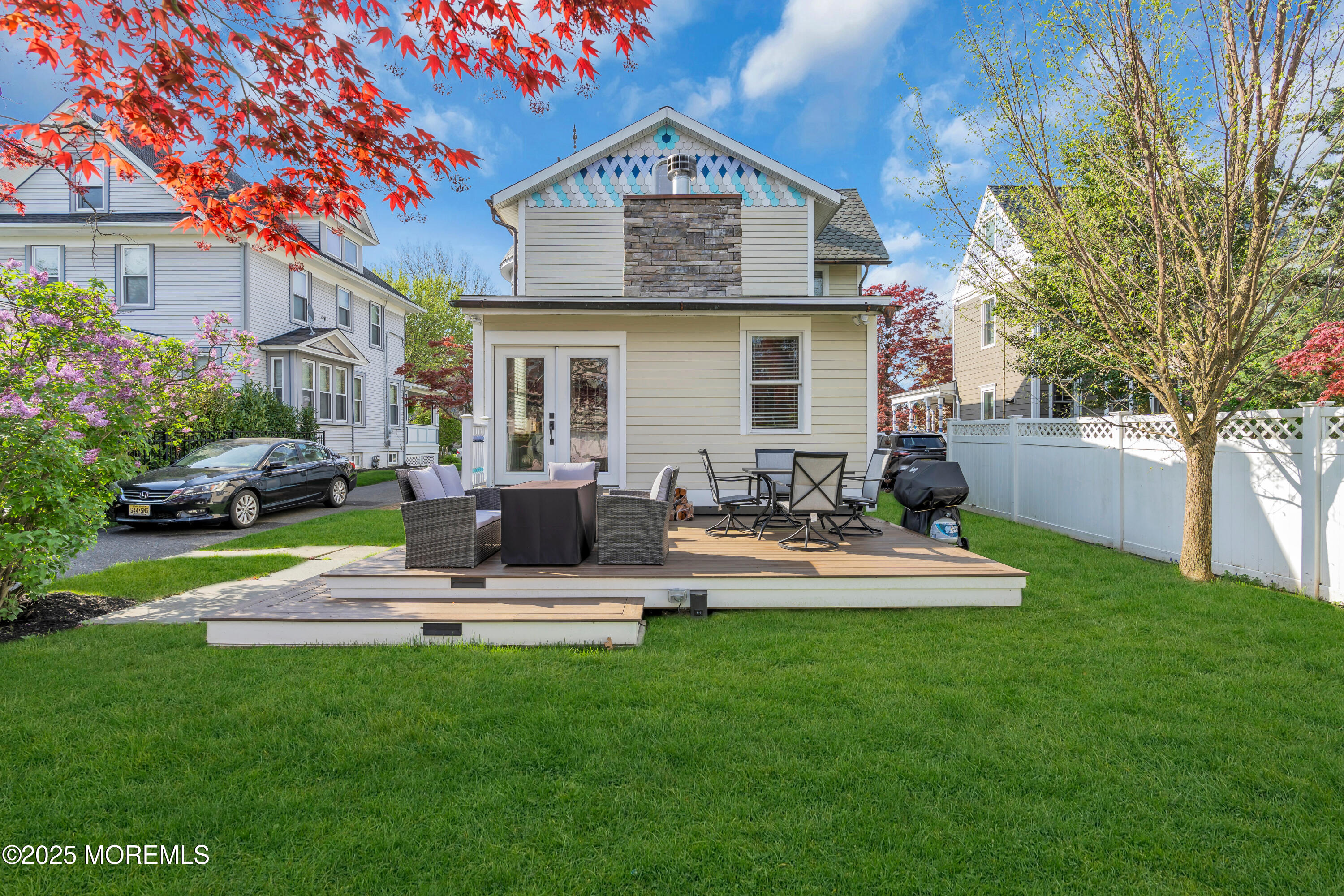 44 Irving Place Red Bank, NJ 07701 - Photo 56 of 74 a view of a house with furniture and fire pit
