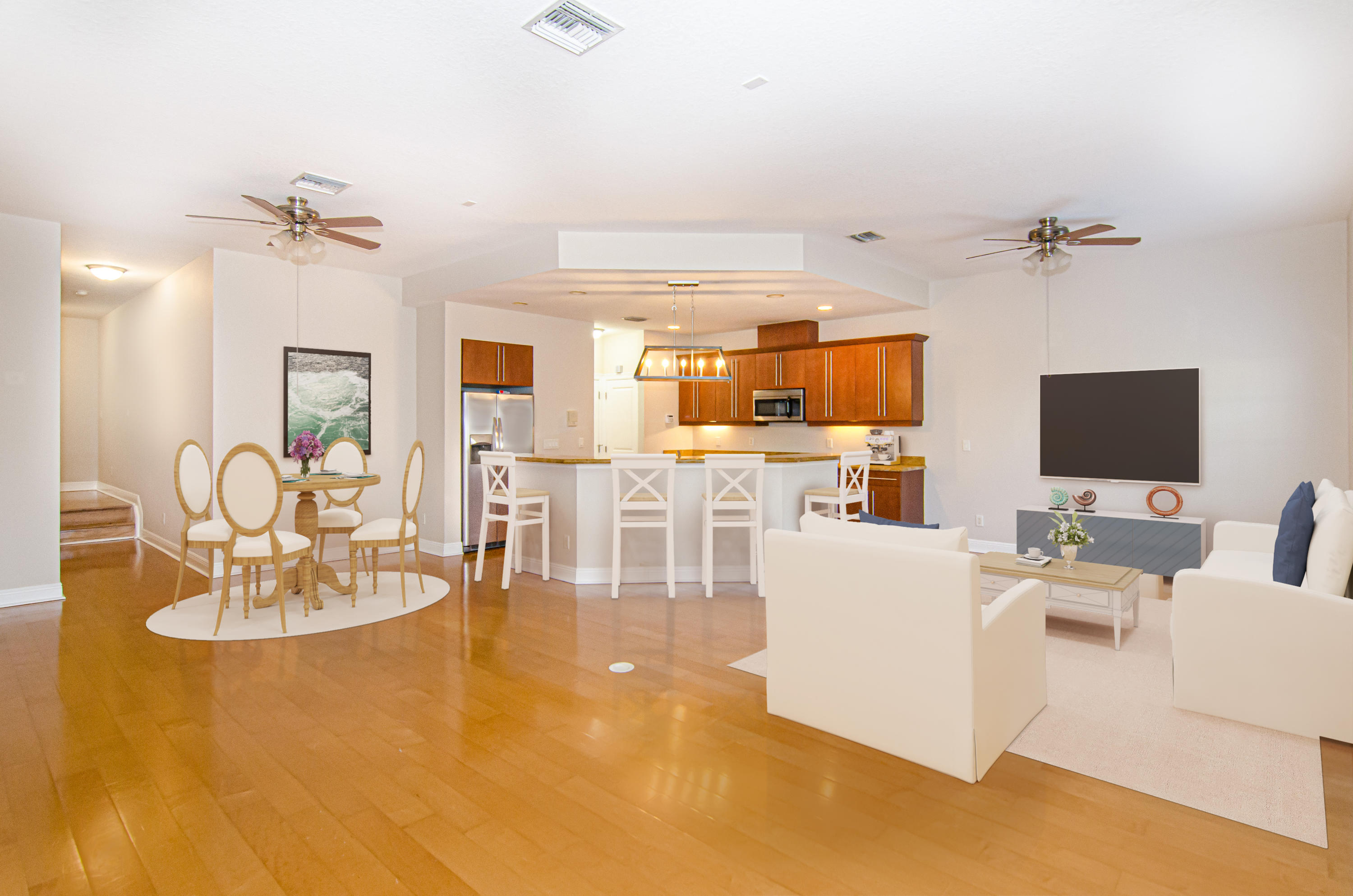 816 Prosperity Farms Road, Unit 2 North Palm Beach, FL 33408 - Photo 1 of 30 a living room with furniture a flat screen tv and kitchen view
