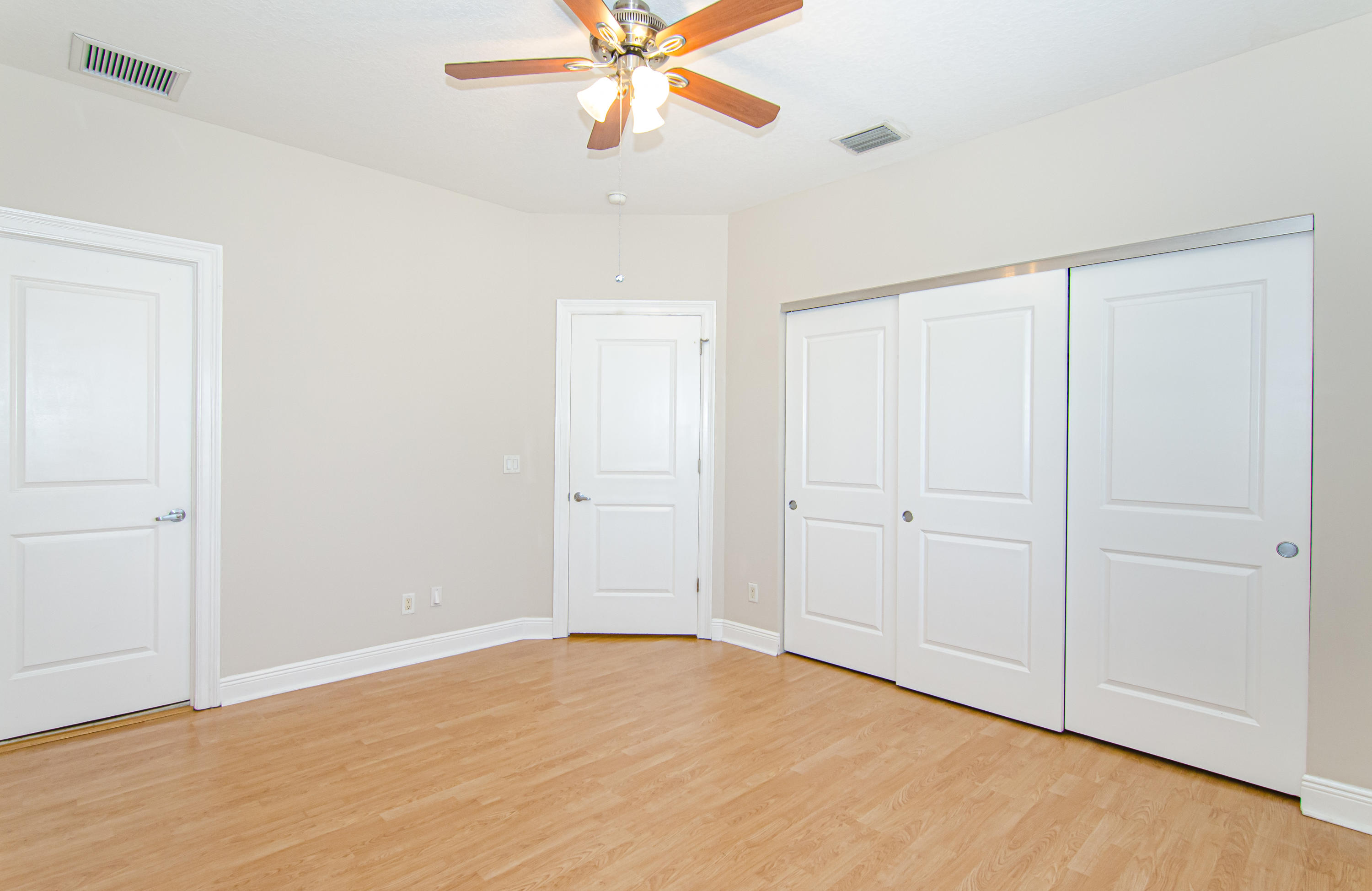816 Prosperity Farms Road, Unit 2 North Palm Beach, FL 33408 - Photo 24 of 30 a view of an empty room with a fan