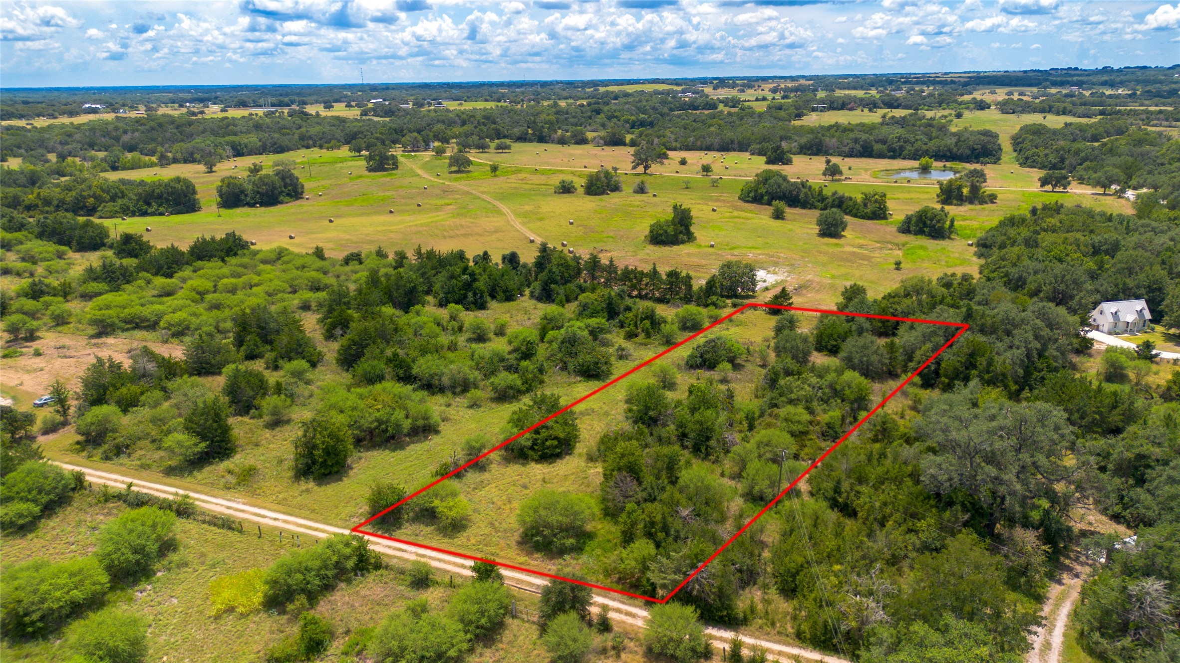 732 Christmas Road Brenham, TX 77833 - Photo 3 of 9 a view of an outdoor space and a lake view