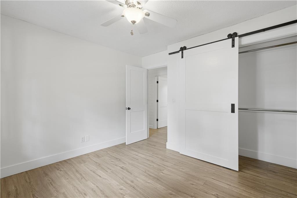 125 Childers Road Canton, GA 30115 - Photo 33 of 48 a view of a room with wooden floor