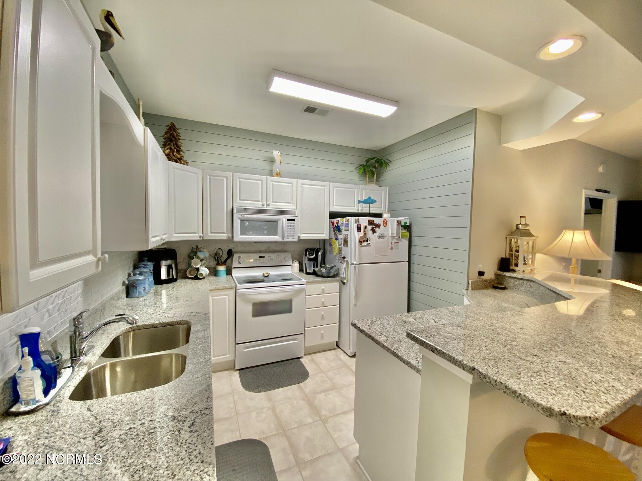 144 Rice Mill Circle, Unit 2 Sunset Beach, NC 28468 - Photo 7 of 40 IMG_5155