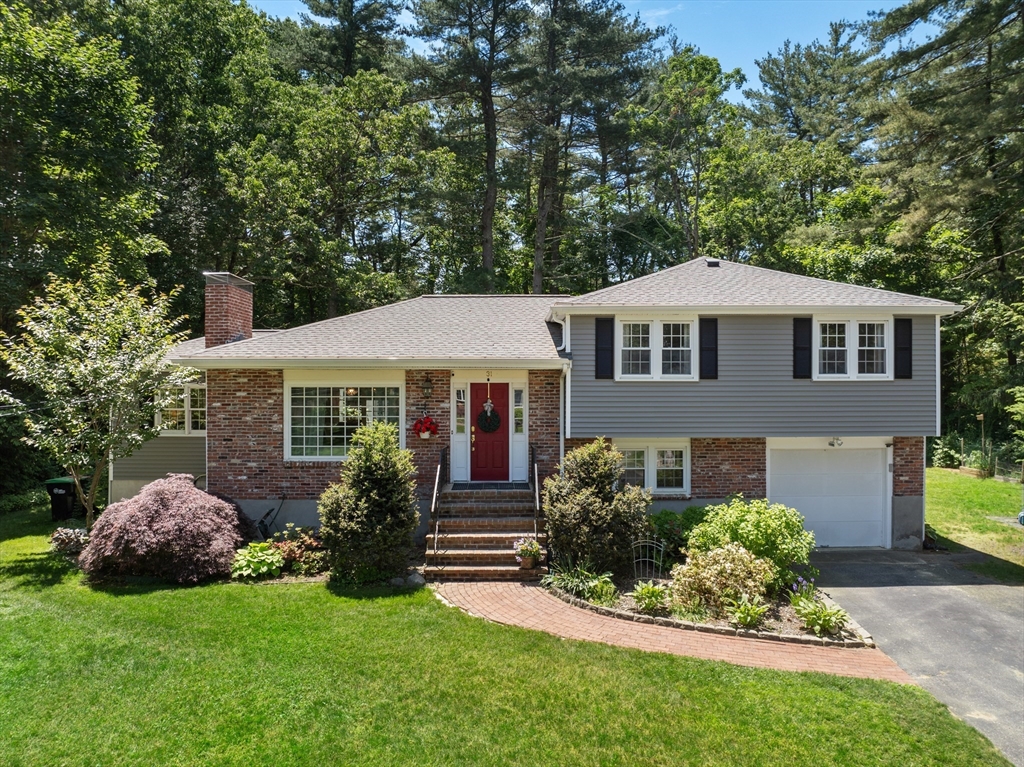 31 Bent Road Sudbury, MA 01776 - Photo 1 of 1 a front view of a house with a garden