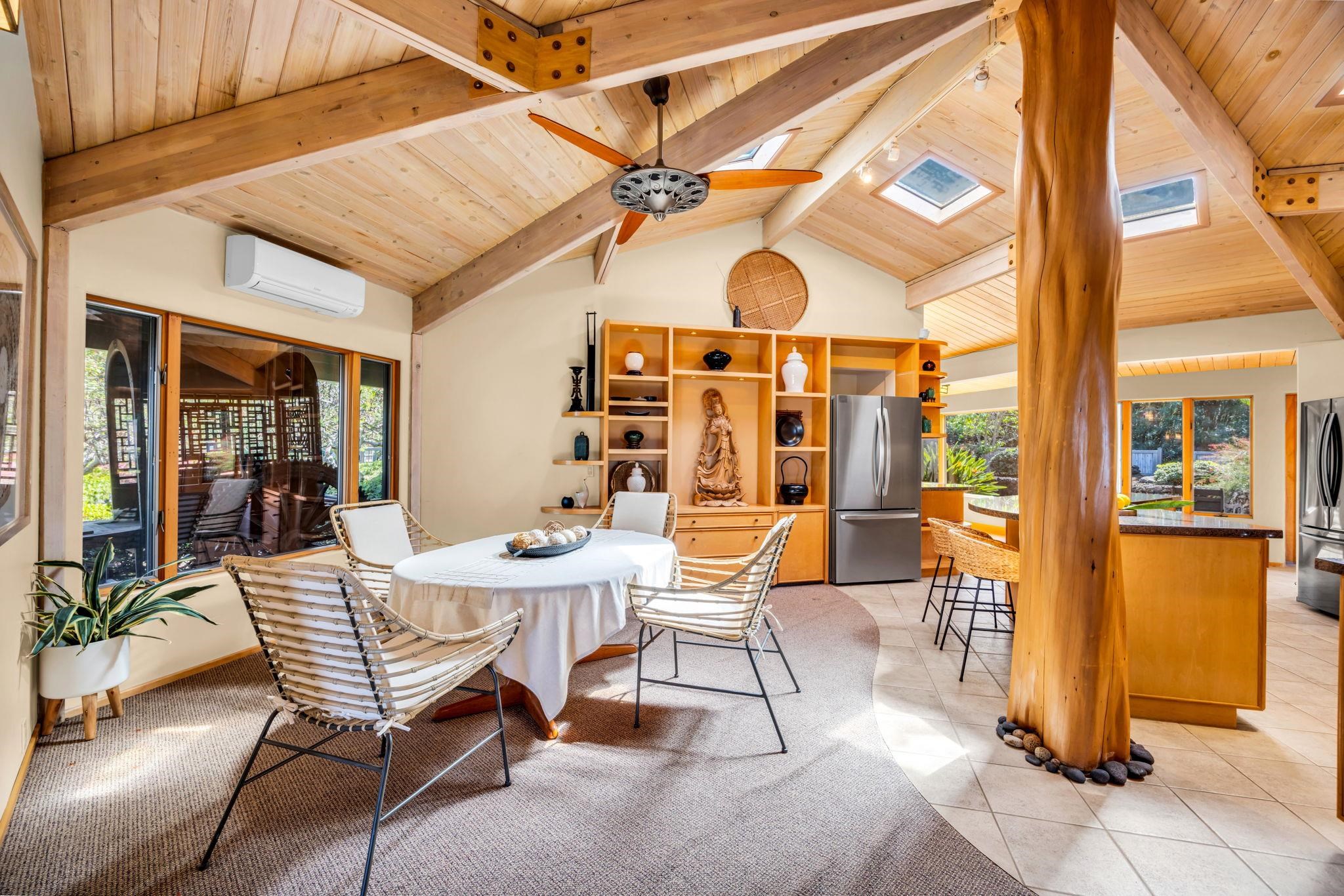50 Poha Place Makawao, HI 96768 - Photo 15 of 50 a dining room with a table and chairs