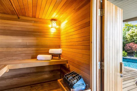 a view of swimming pool with a table and chairs