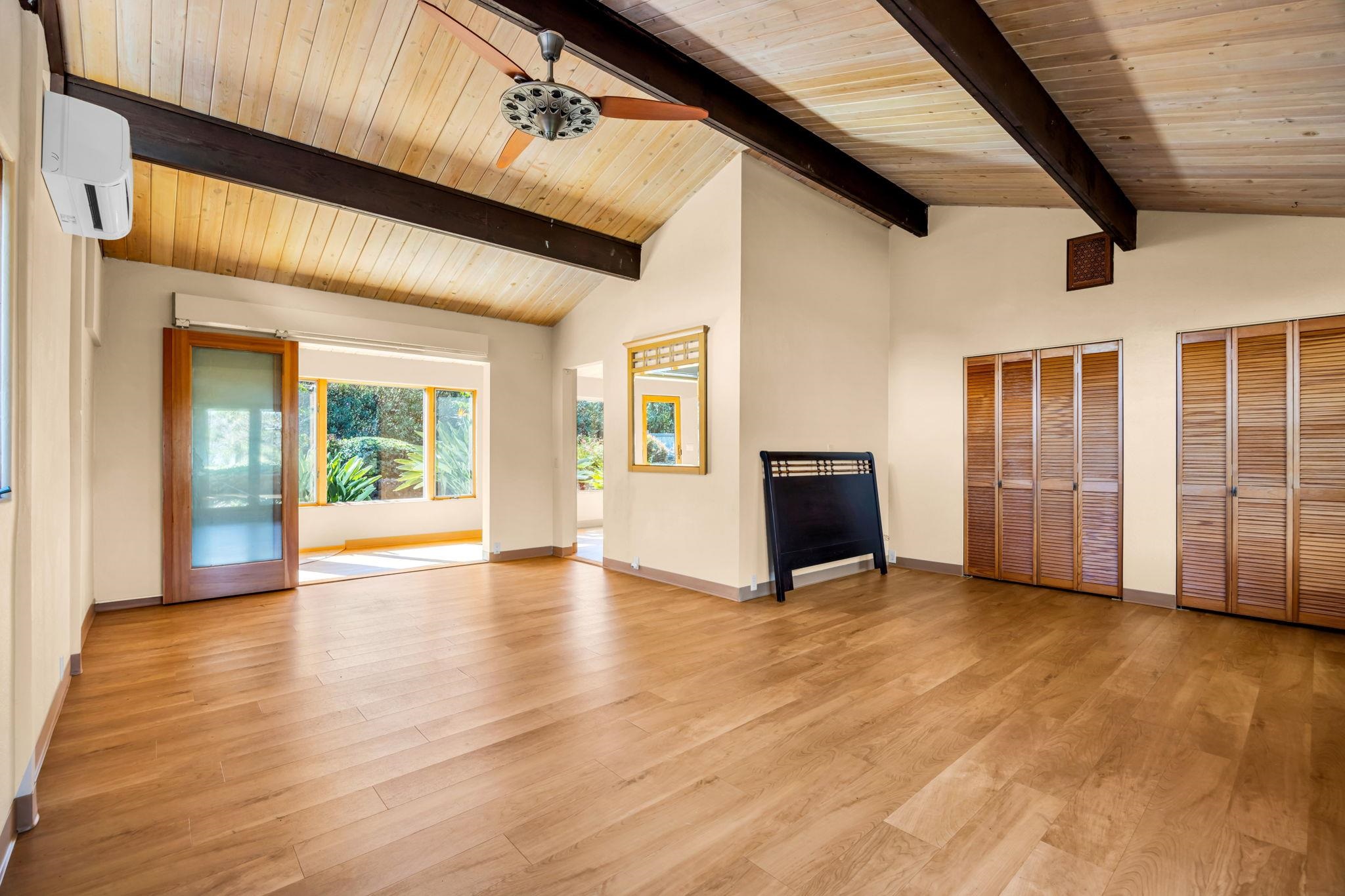 50 Poha Place Makawao, HI 96768 - Photo 33 of 50 a view of an empty room with wooden floor and a window