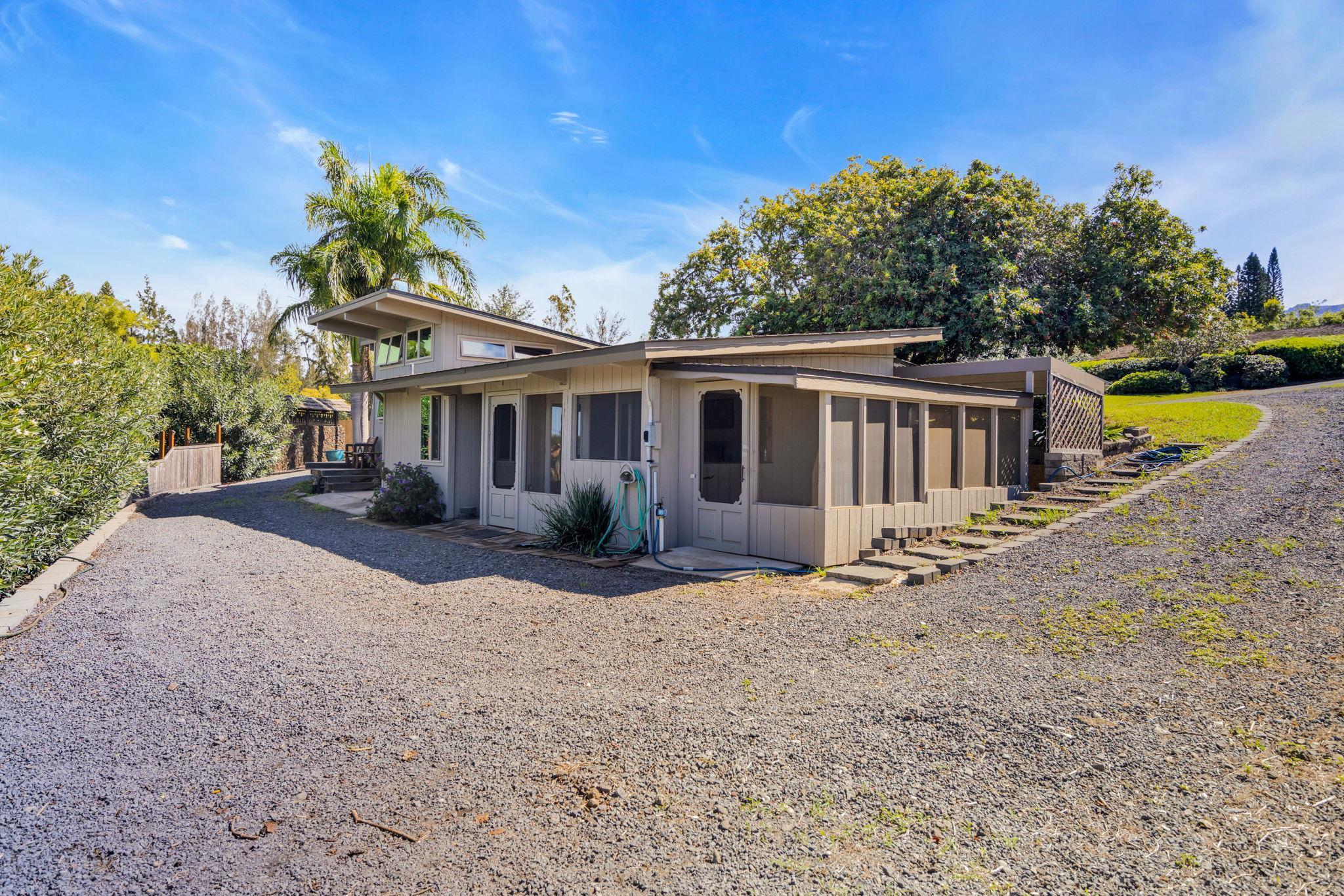 50 Poha Place Makawao, HI 96768 - Photo 45 of 50 a view of a house with backyard and sitting area