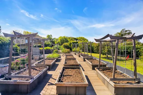 an aerial view of residential house with swimming pool