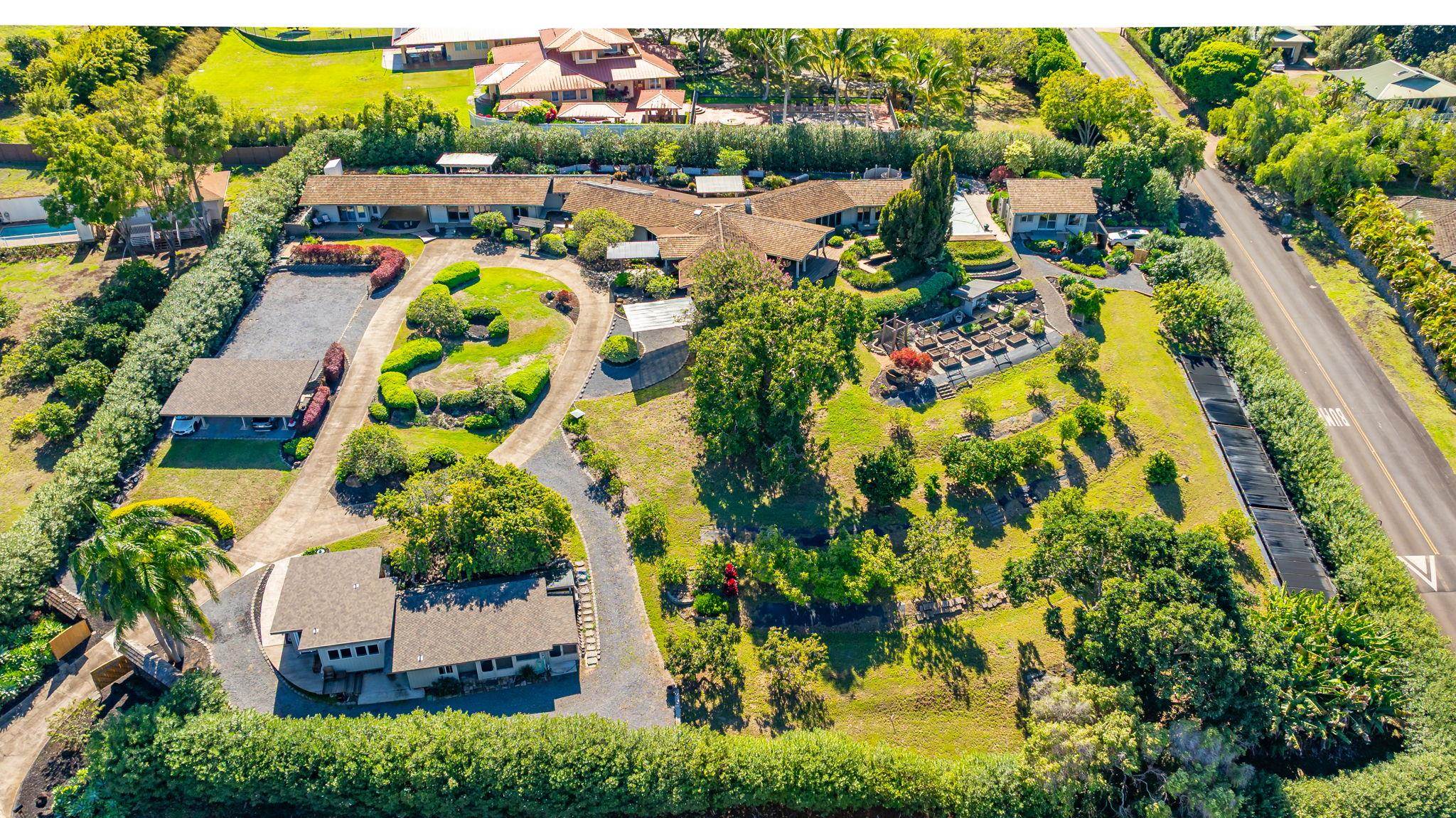 50 Poha Place Makawao, HI 96768 - Photo 50 of 50 an aerial view of residential house with swimming pool
