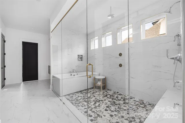 a bathroom with a bathtub sink and toilet