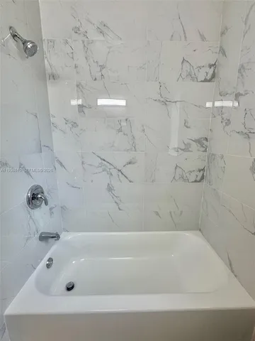 a bathroom with a bathtub