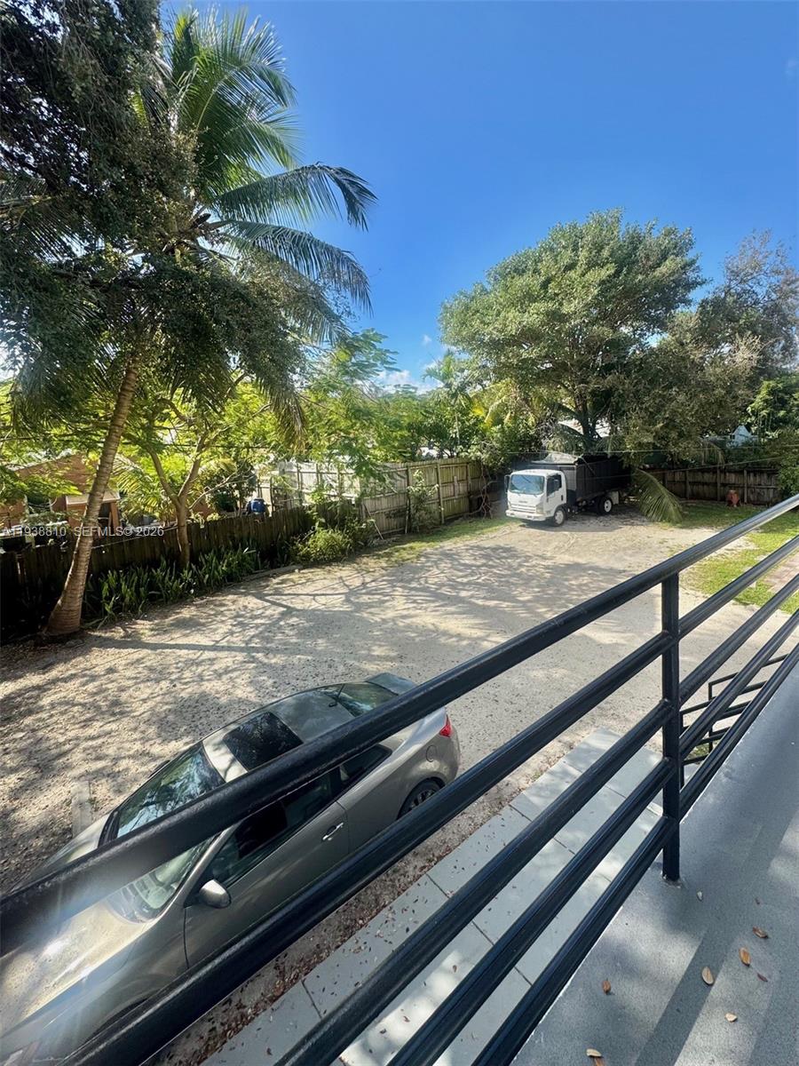 530 Northeast 71st Street, Unit 2 Miami, FL 33138 - Photo 22 of 22 a view of street with view of trees