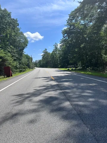 a view of road and trees