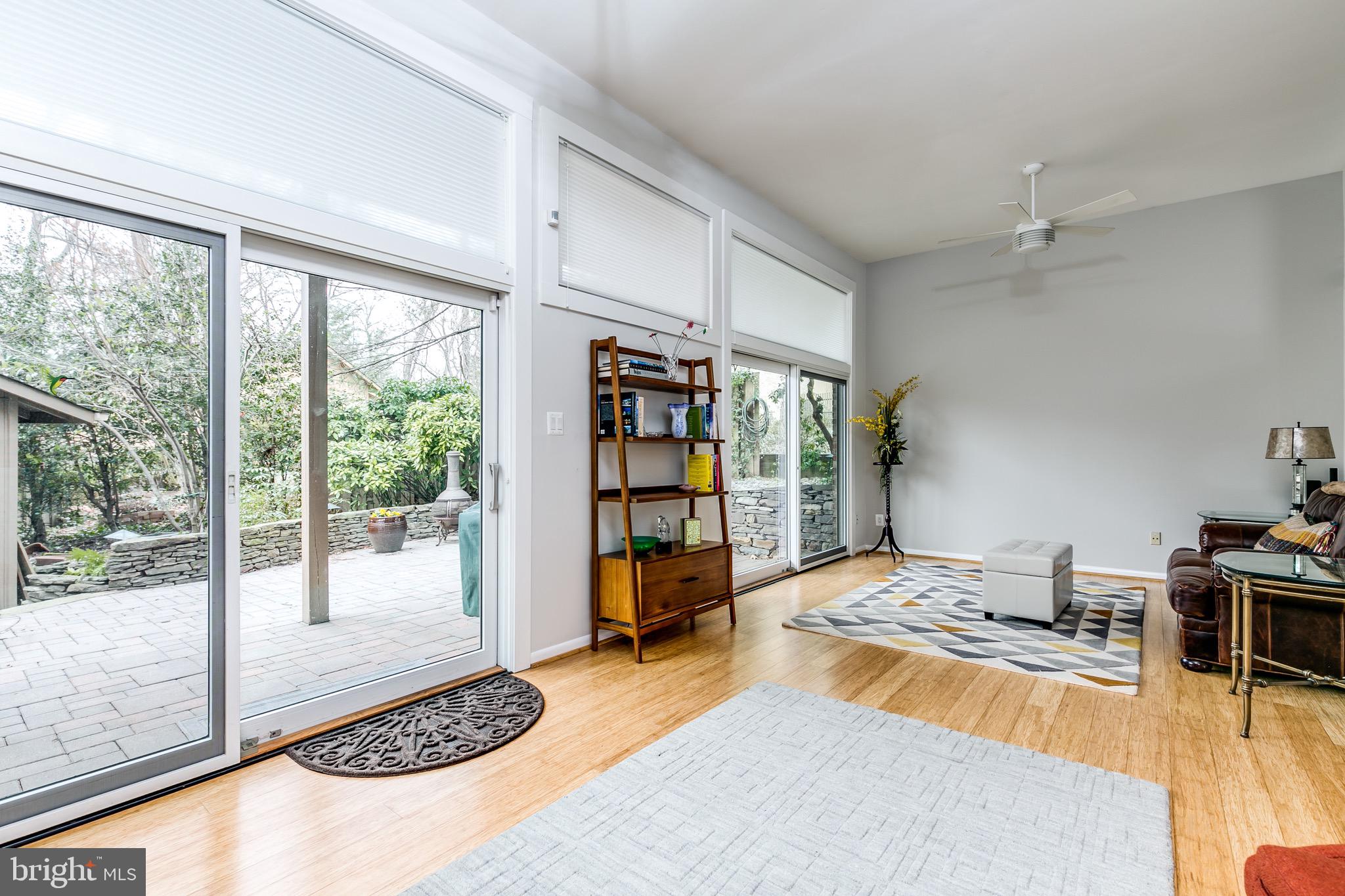 11310 Fairway Court Reston, VA 20190 - Photo 14 of 33 Huge family room with wall-to-wall sliders