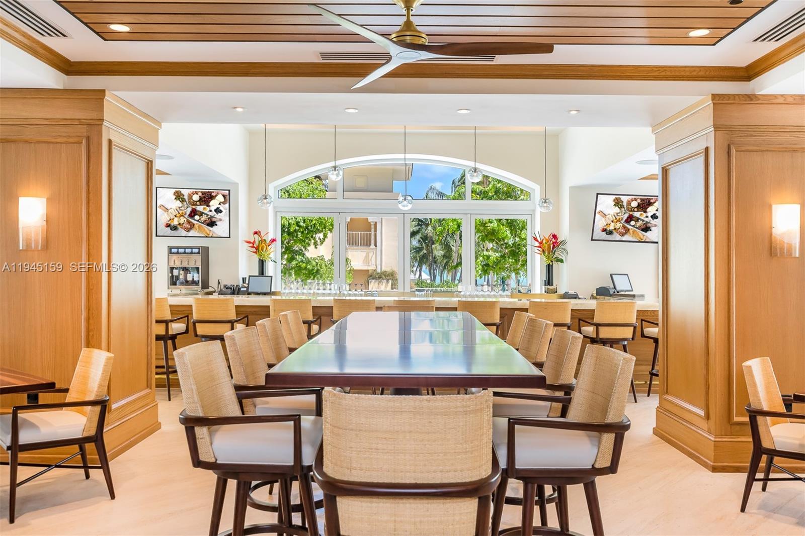 789 Crandon Boulevard, Unit 1106 Key Biscayne, FL 33149 - Photo 19 of 44 a view of a dining room with furniture window and outside view