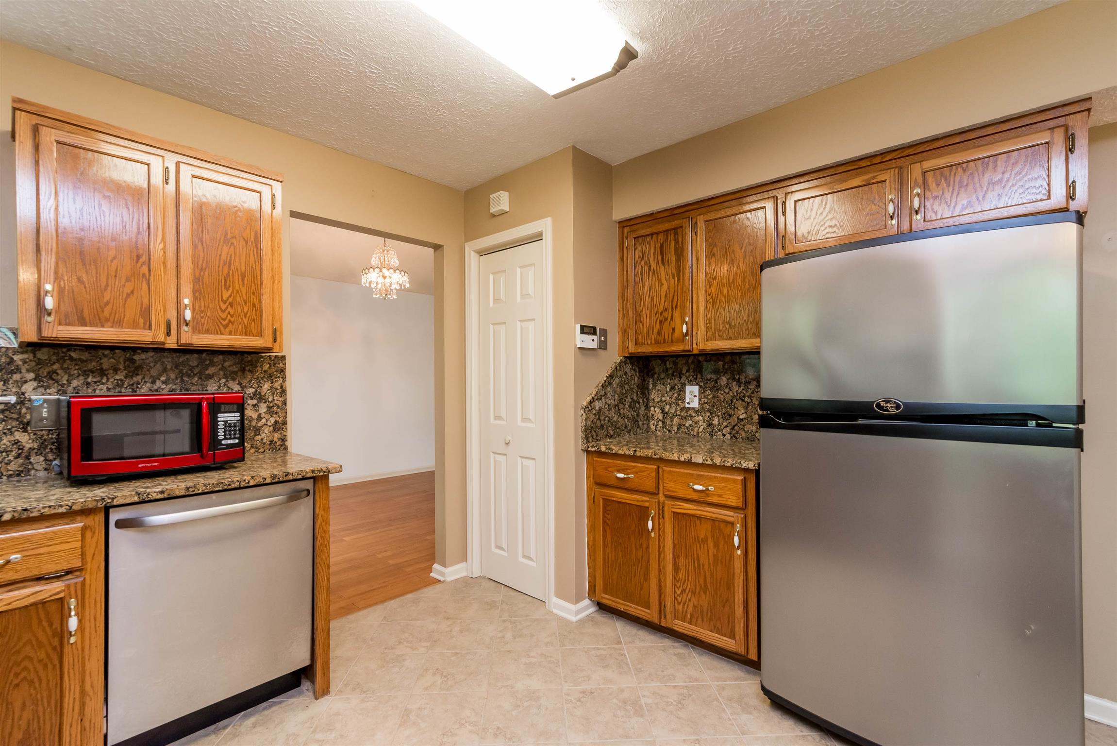 1000 Aldersgate Road Antioch, TN 37013 - Photo 6 of 30 a kitchen with stainless steel appliances a refrigerator and cabinets