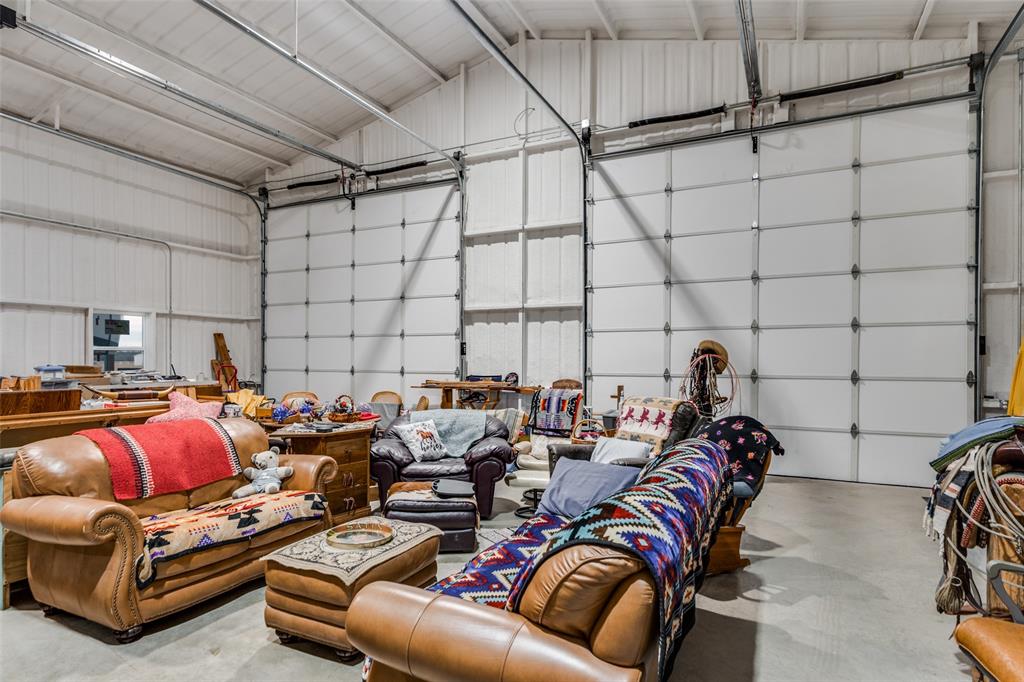 218 Homestead Court Lipan, TX 76462 - Photo 11 of 17 a living room with furniture a couch and a table