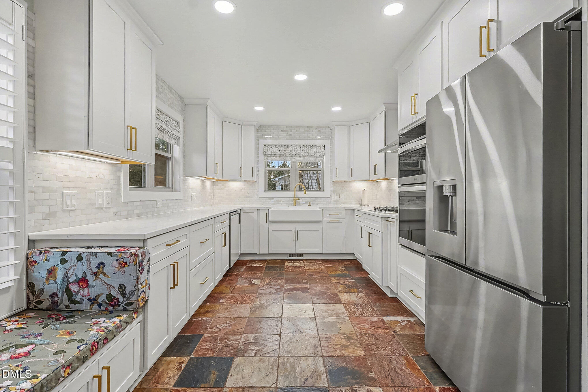735 Cross Link Drive Angier, NC 27501 - Photo 13 of 73 a large kitchen with stainless steel appliances granite countertop a refrigerator sink and cabinets
