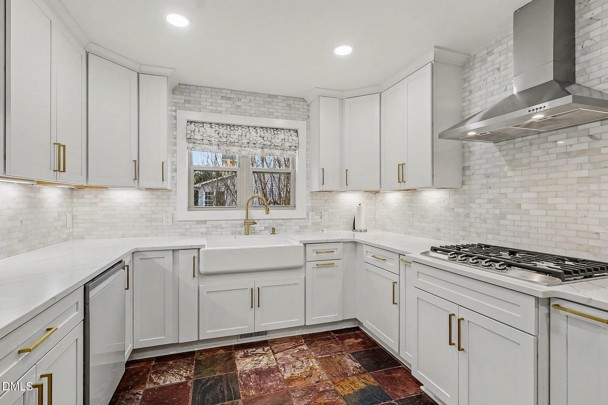 735 Cross Link Drive Angier, NC 27501 - Photo 14 of 73 a kitchen with granite countertop a sink stove and cabinets
