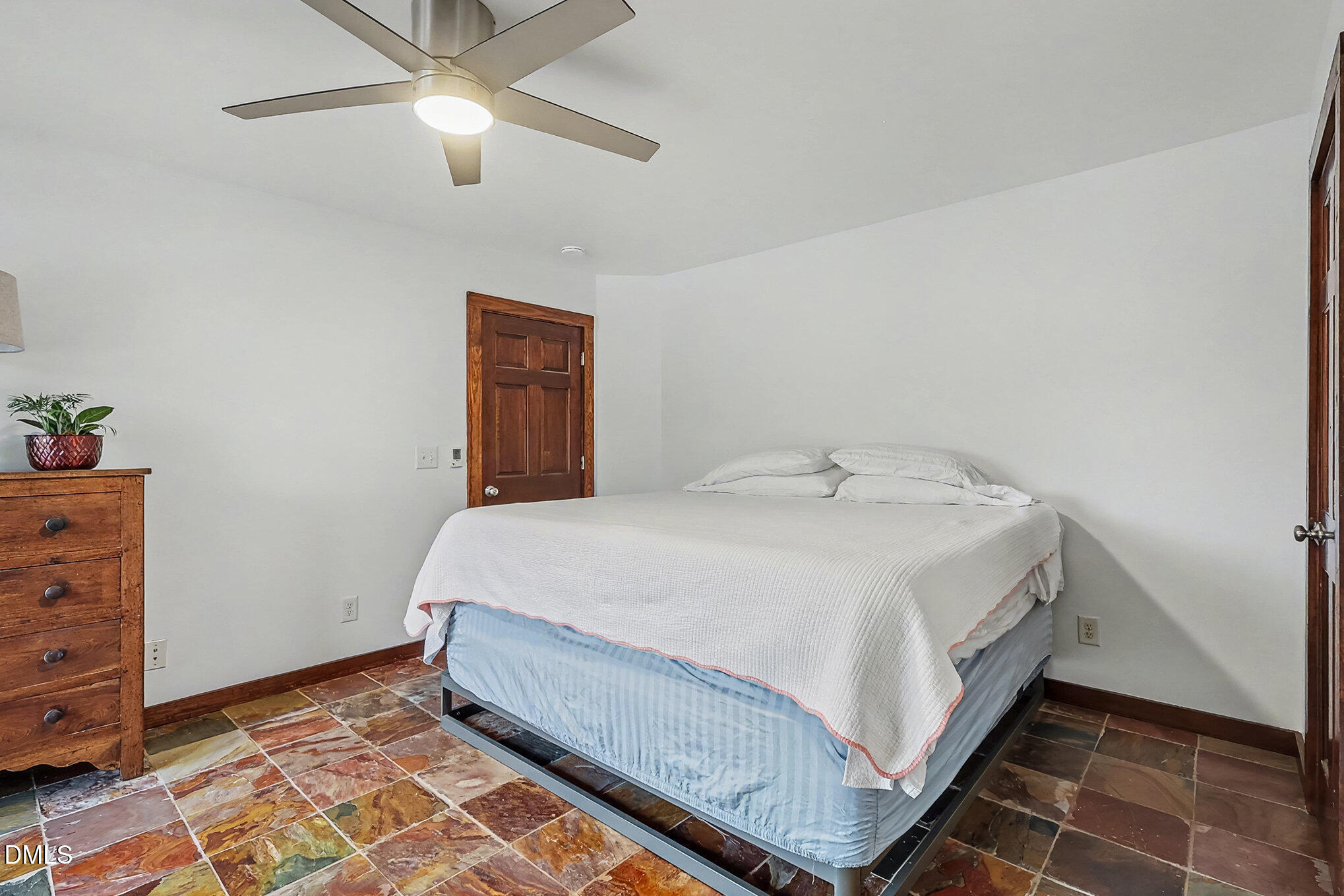 735 Cross Link Drive Angier, NC 27501 - Photo 22 of 73 a bedroom with a bed and a dresser