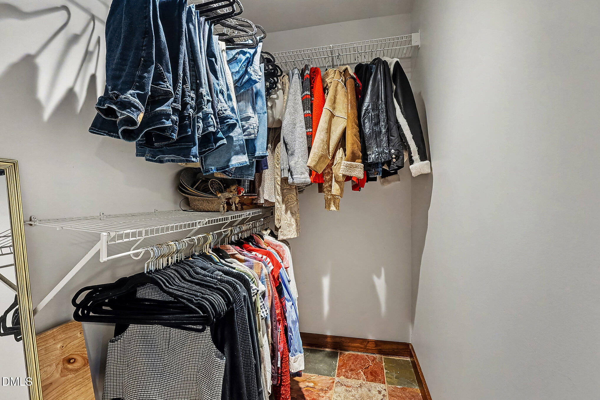 735 Cross Link Drive Angier, NC 27501 - Photo 25 of 73 a view of walk in closet with clothes and shoes