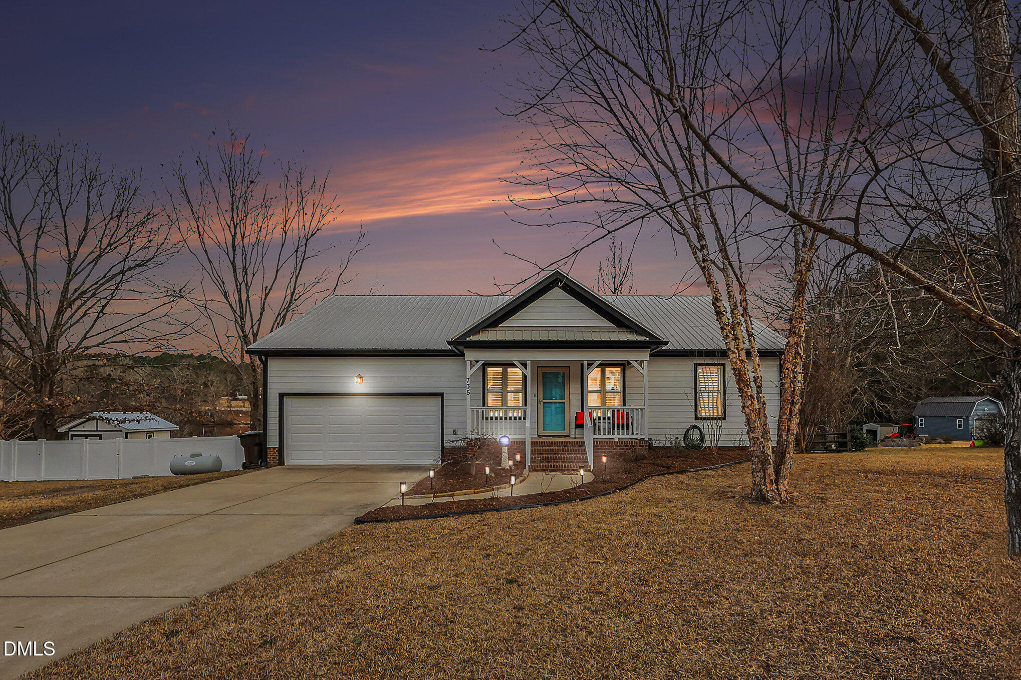 735 Cross Link Drive Angier, NC 27501 - Photo 3 of 73 a front view of a house with a yard