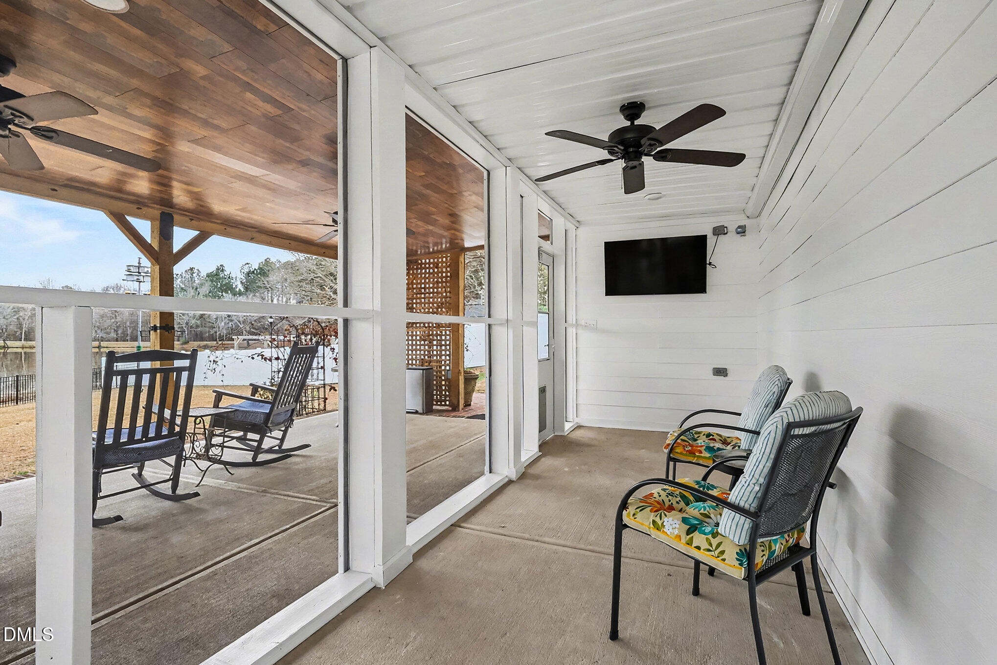 735 Cross Link Drive Angier, NC 27501 - Photo 34 of 73 a view of a livingroom with furniture and a ceiling fan