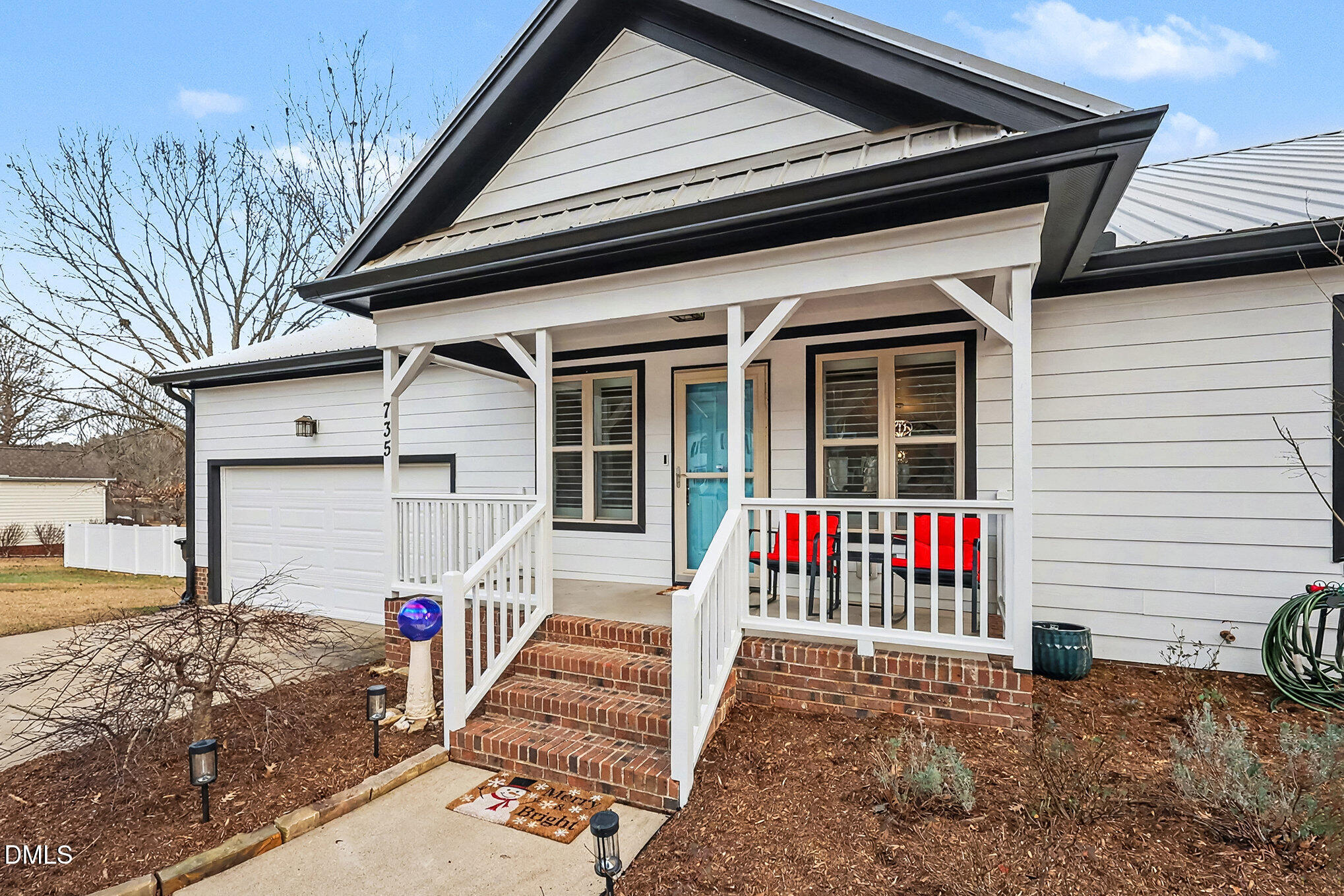 735 Cross Link Drive Angier, NC 27501 - Photo 5 of 73 a front view of a house with a porch