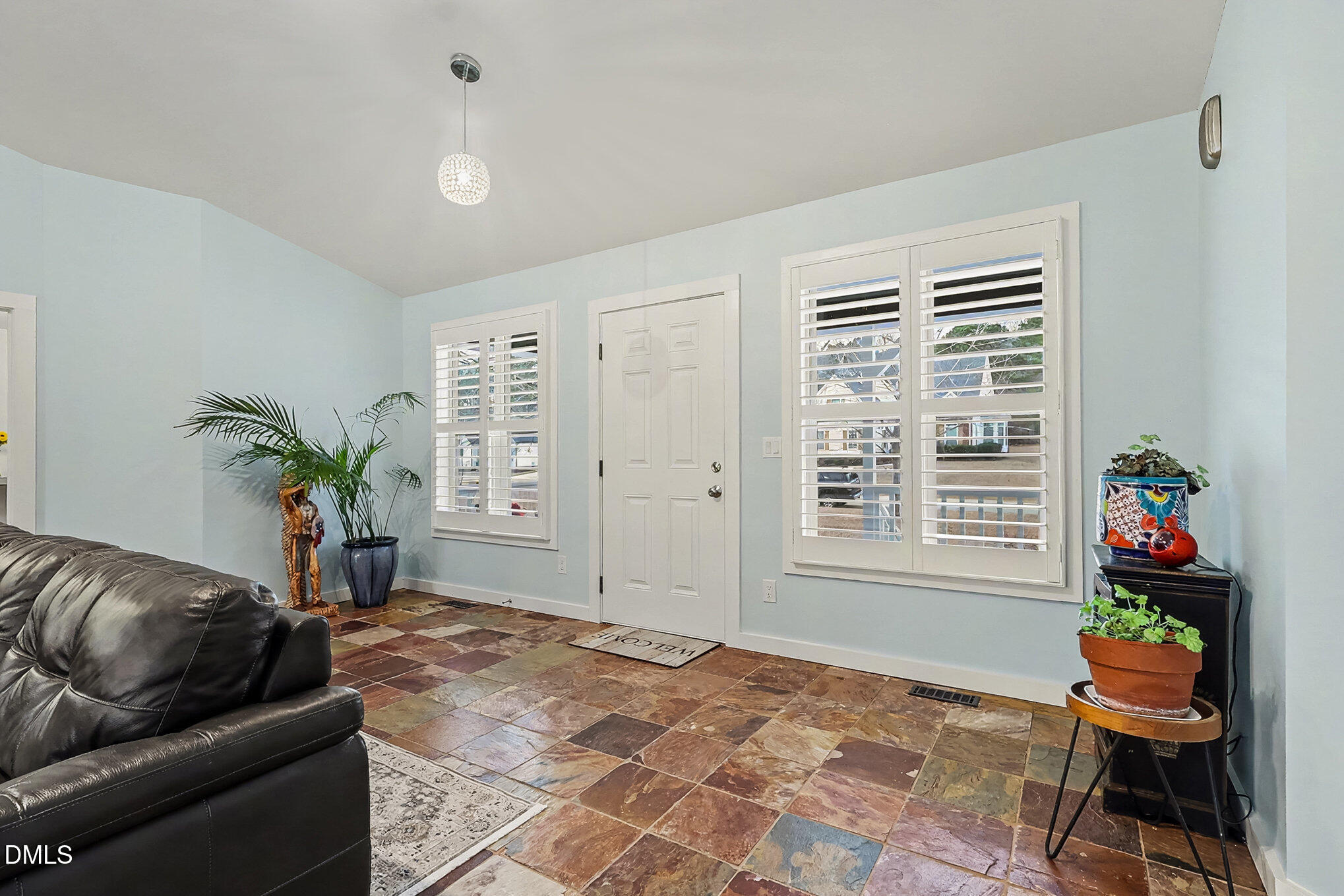 735 Cross Link Drive Angier, NC 27501 - Photo 6 of 73 a living room with furniture and a potted plant