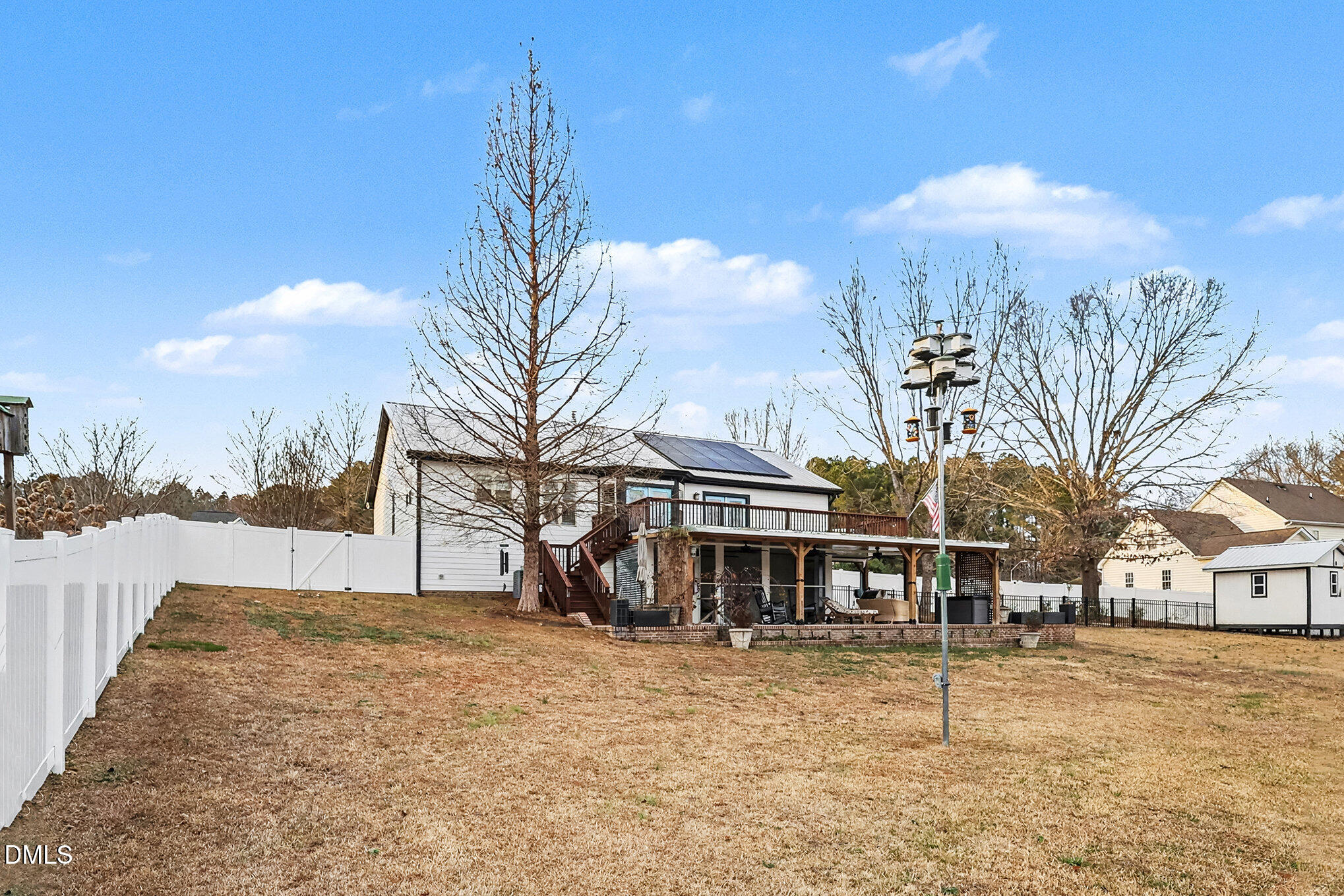735 Cross Link Drive Angier, NC 27501 - Photo 64 of 73 a front view of a house with a yard and garage