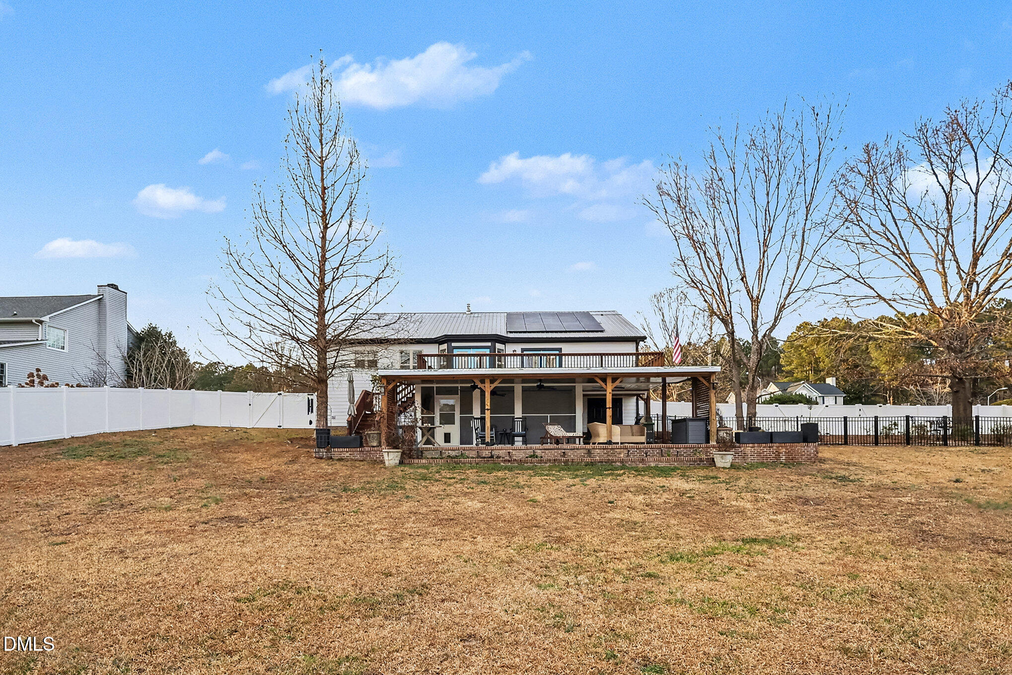 735 Cross Link Drive Angier, NC 27501 - Photo 65 of 73 a view of a house with a big yard and large trees