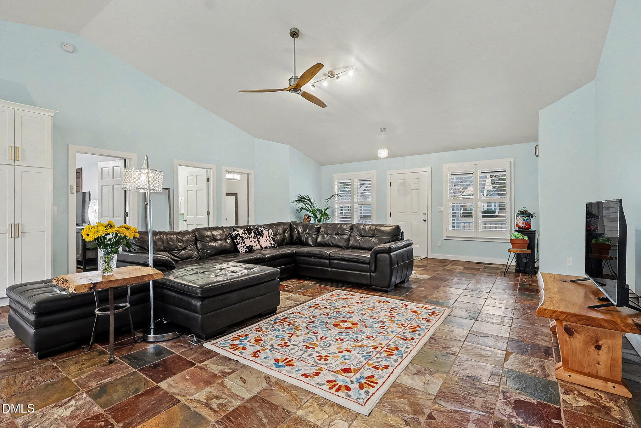 735 Cross Link Drive Angier, NC 27501 - Photo 7 of 73 a living room with furniture a rug and a flat screen tv